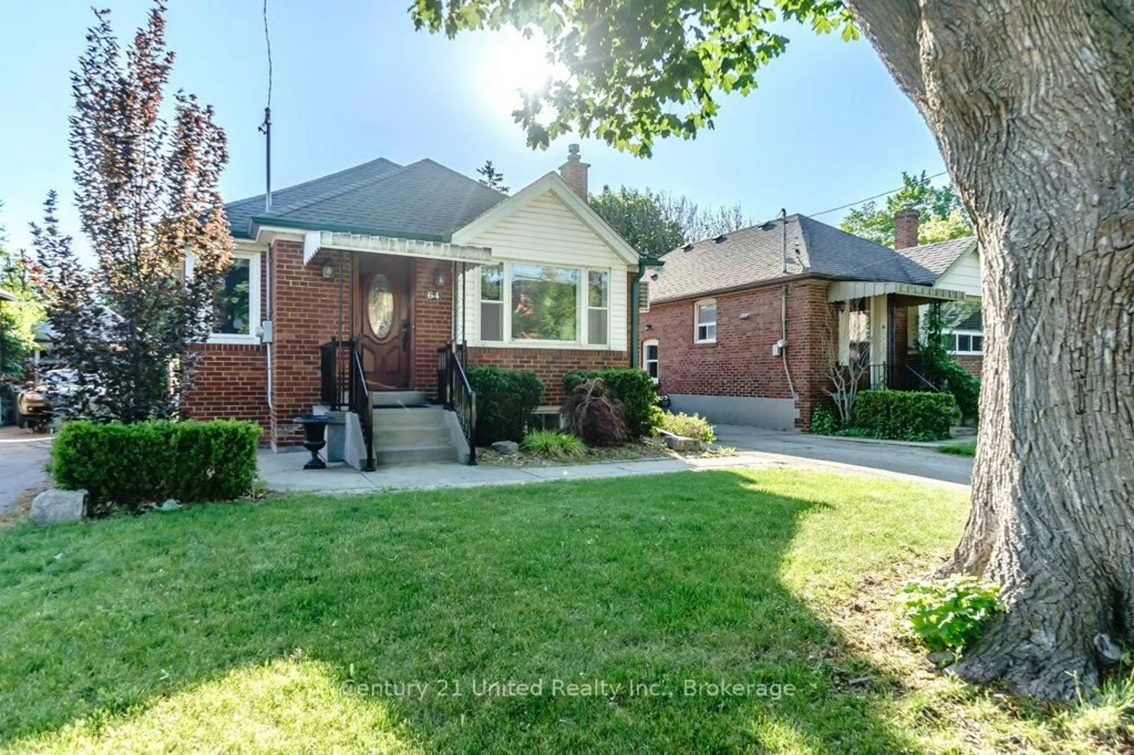 Home with brick exterior material, street for 64 Renown Rd, Toronto Ontario M9A 2E5
