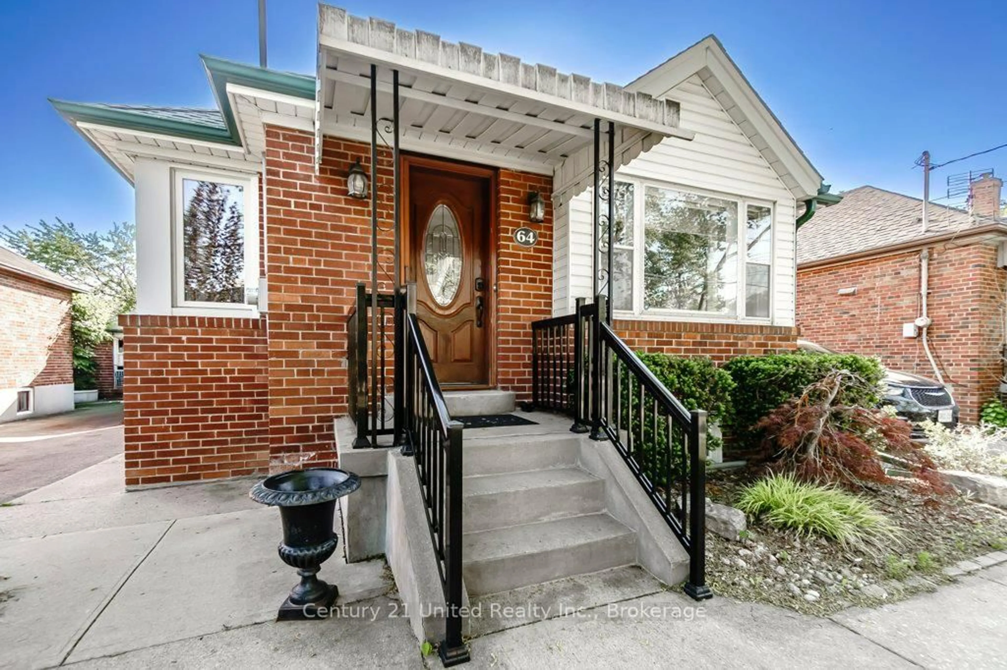 Home with brick exterior material, street for 64 Renown Rd, Toronto Ontario M9A 2E5