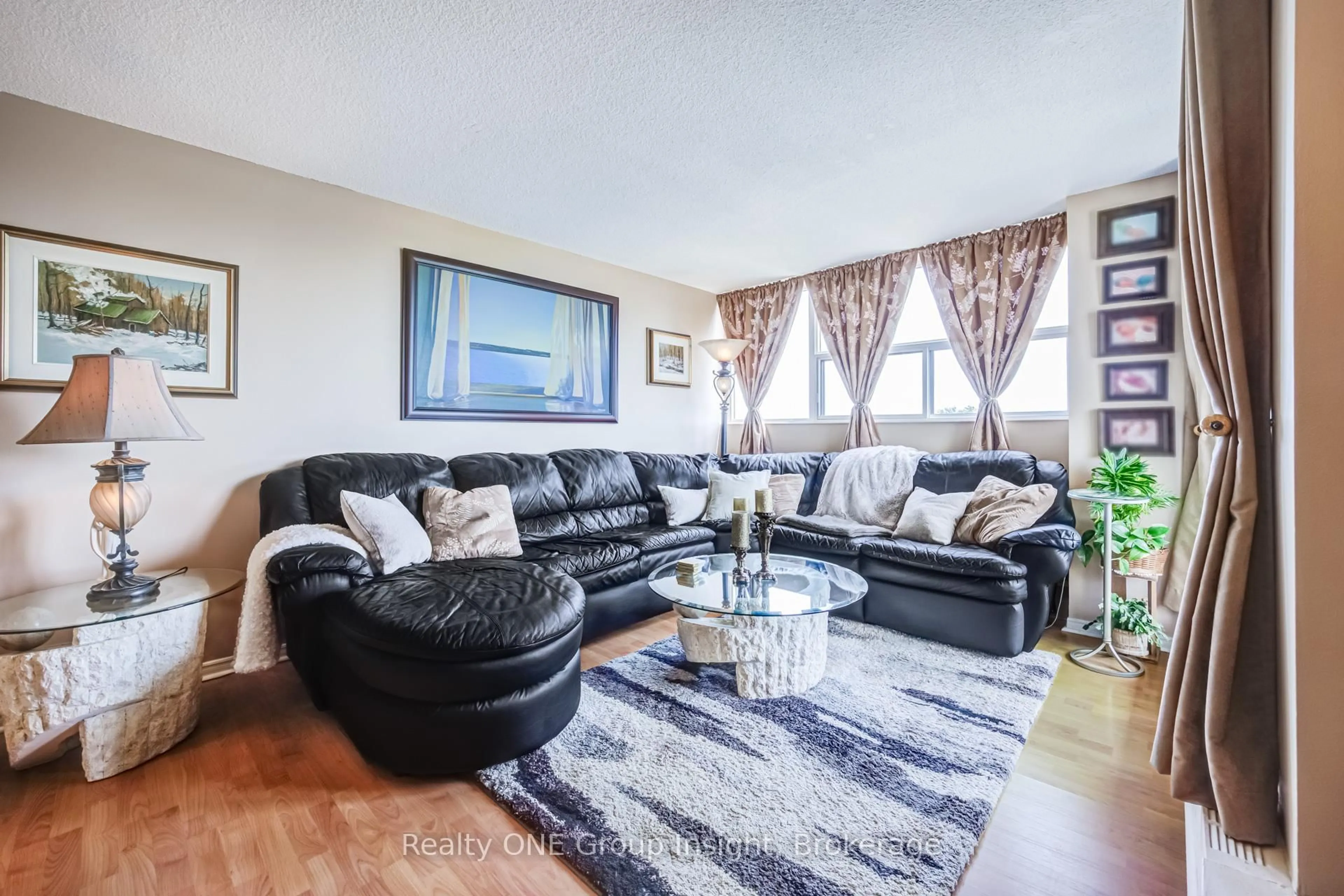 Living room with furniture, unknown for 2900 Battleford Rd #516, Mississauga Ontario L5N 2V9