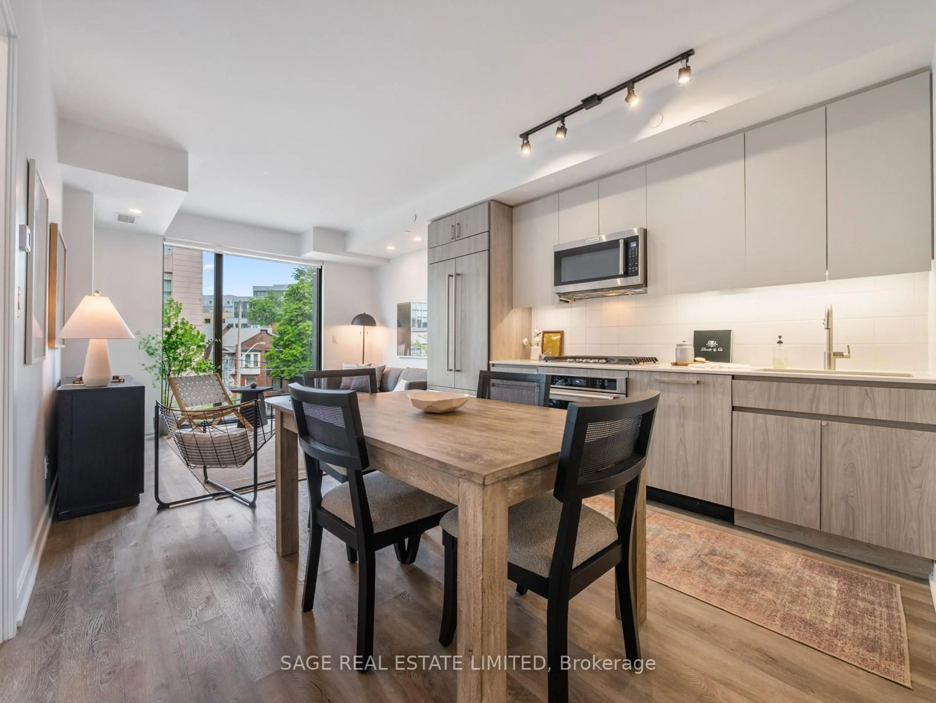 Open concept kitchen, wood/laminate floor for 430 Roncesvalles Ave #304, Toronto Ontario M6R 0A6