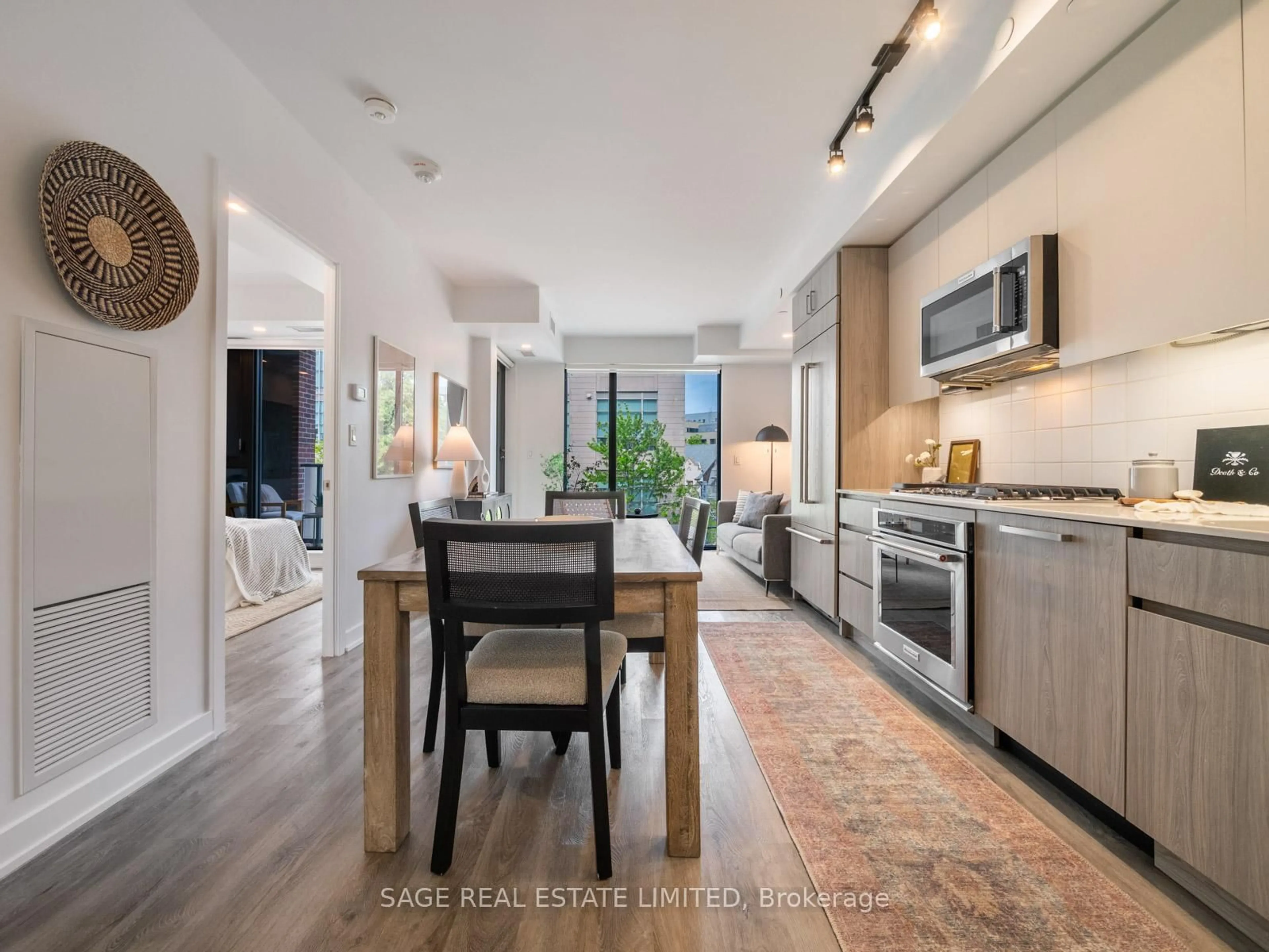 Open concept kitchen, ceramic/tile floor for 430 Roncesvalles Ave #304, Toronto Ontario M6R 0A6