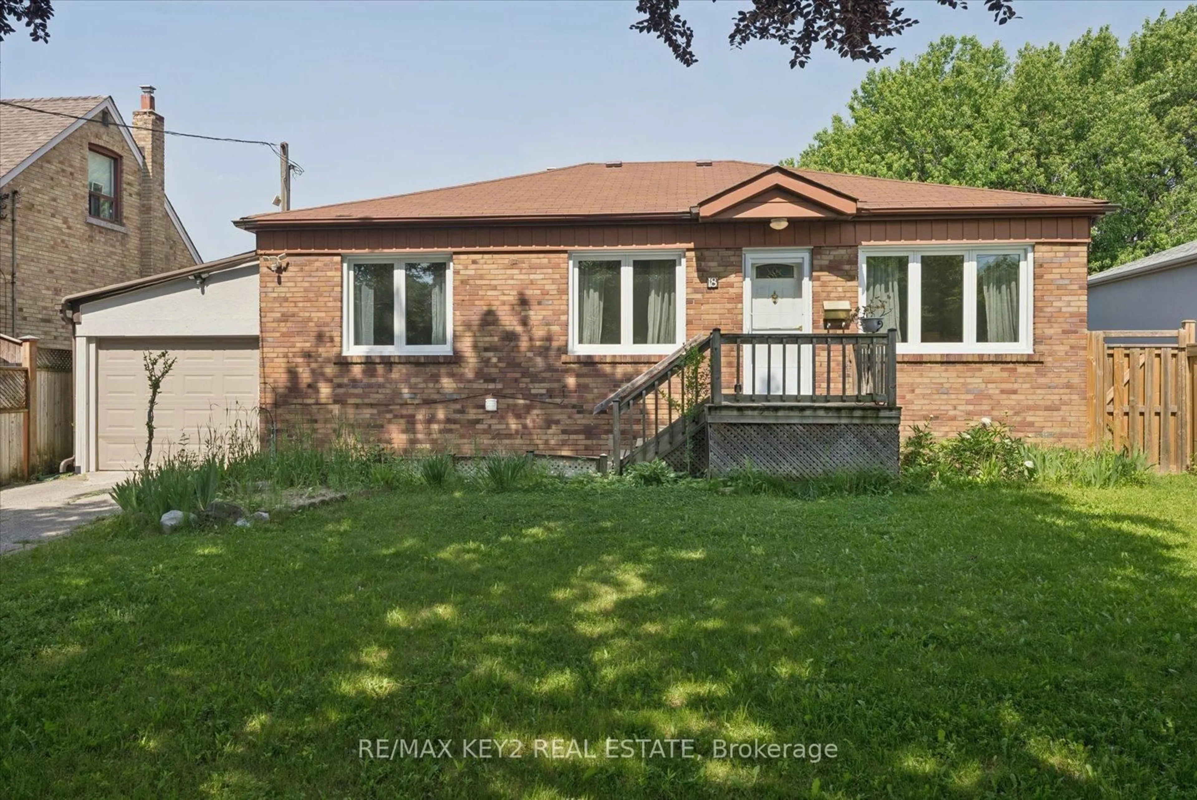 Home with brick exterior material, street for 18 Jodphur Ave, Toronto Ontario M9M 2J4