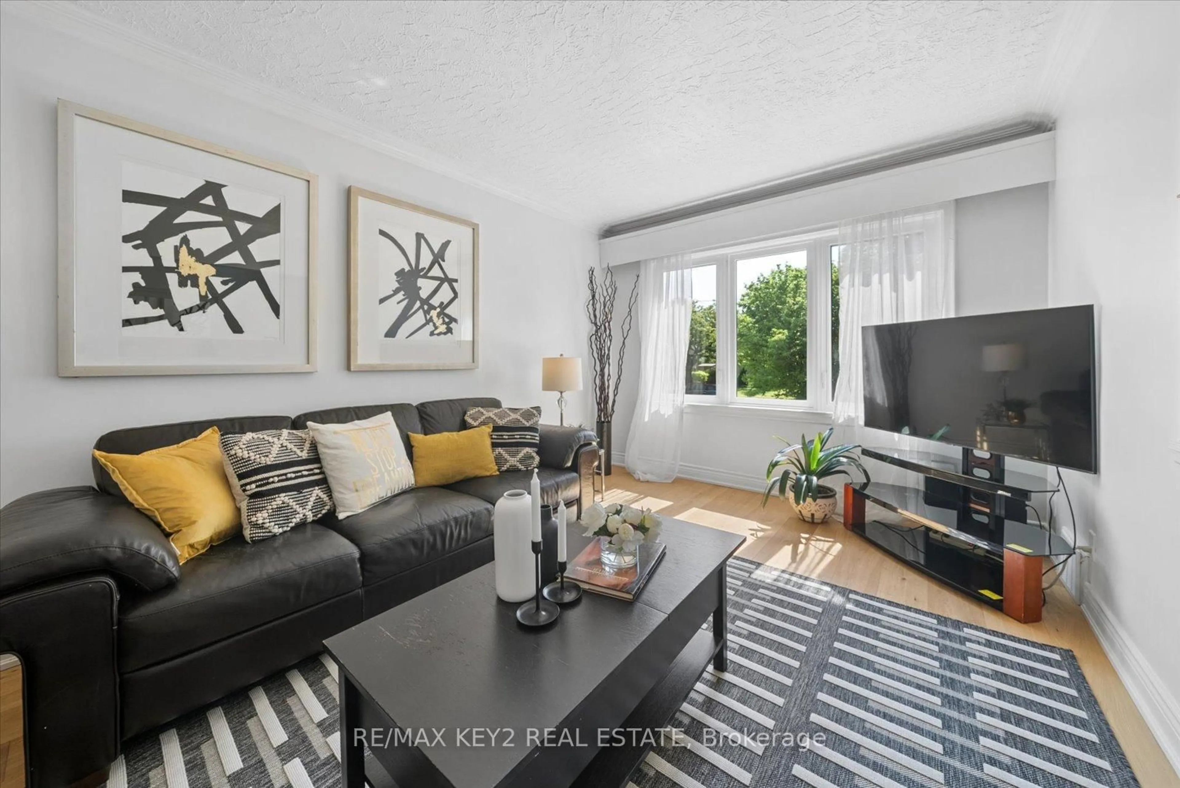 Living room with furniture, unknown for 18 Jodphur Ave, Toronto Ontario M9M 2J4