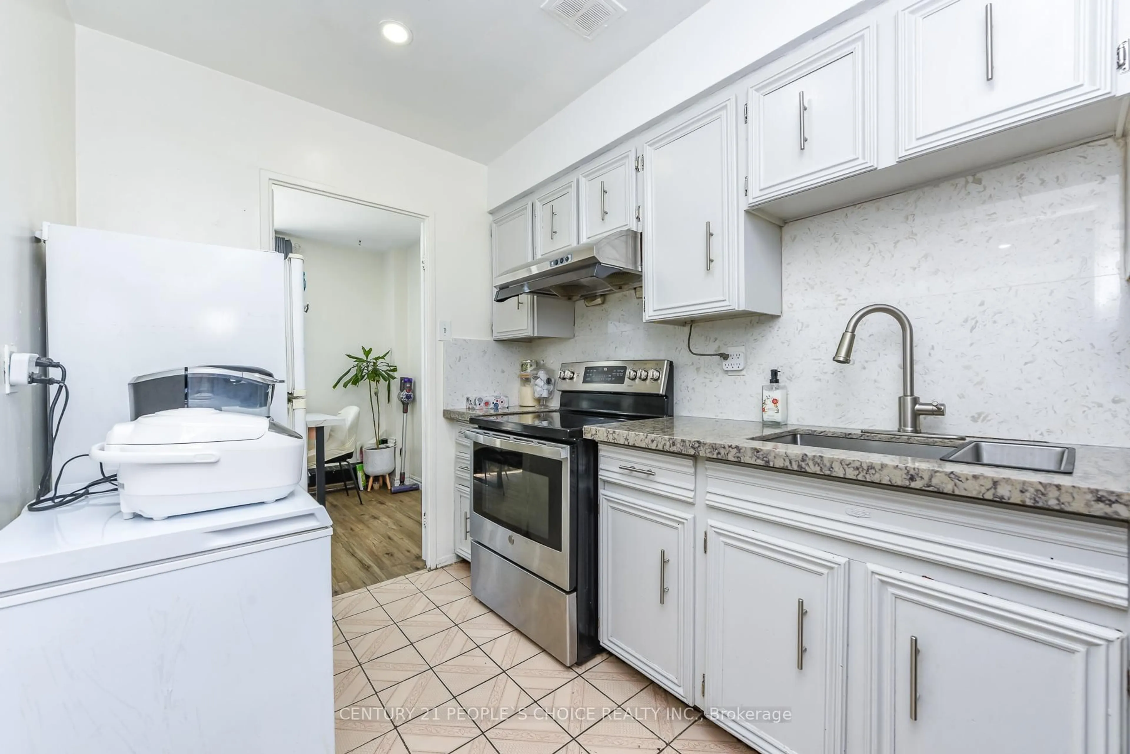 Standard kitchen, ceramic/tile floor for 10 Eddystone Ave #108, Toronto Ontario M3N 2T2