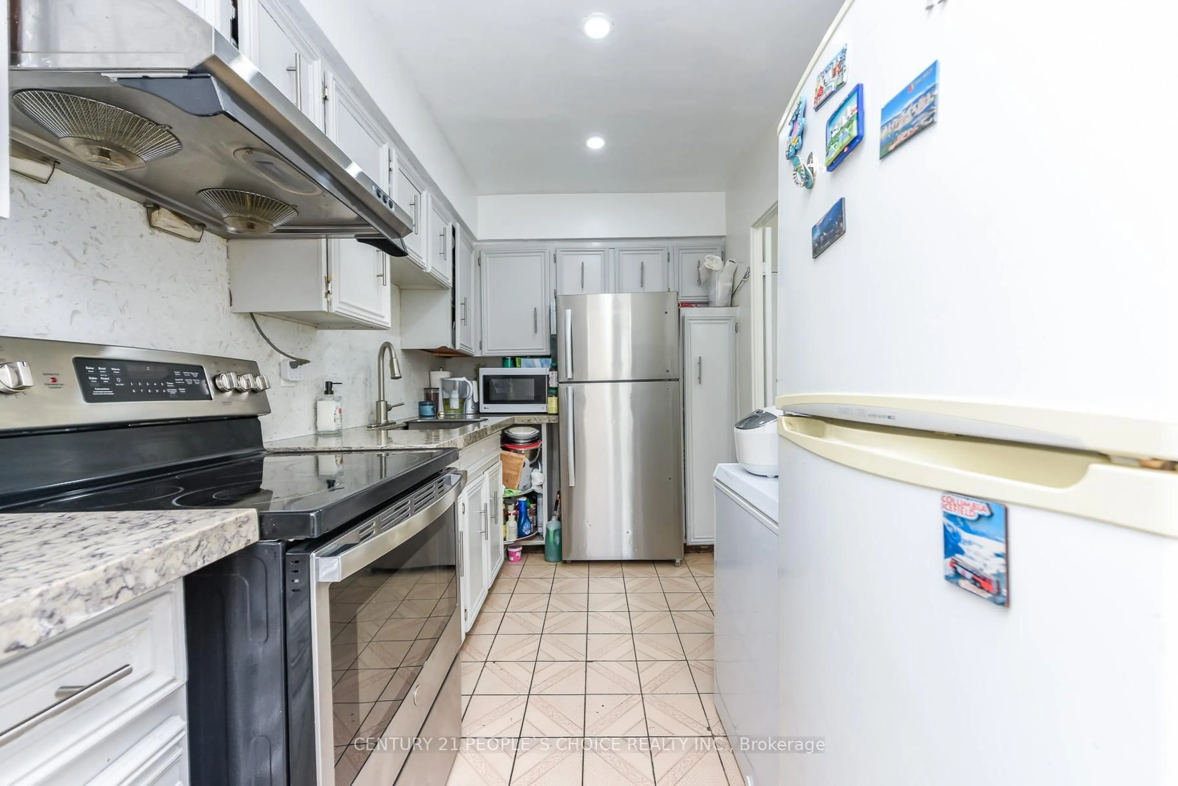 Standard kitchen, ceramic/tile floor for 10 Eddystone Ave #108, Toronto Ontario M3N 2T2