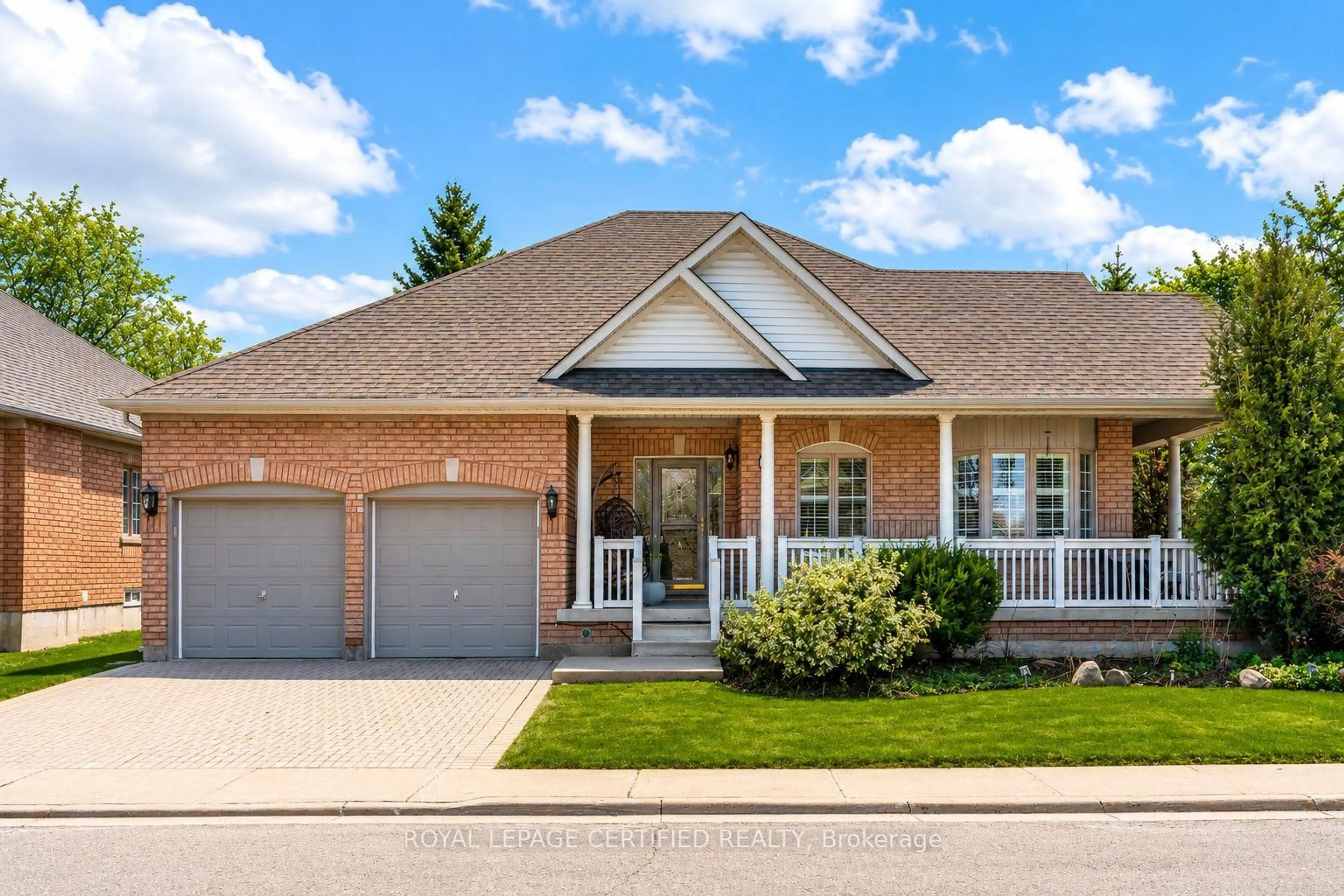 Home with brick exterior material, street for 2 Orchard Park Gate, Brampton Ontario L6R 1W5