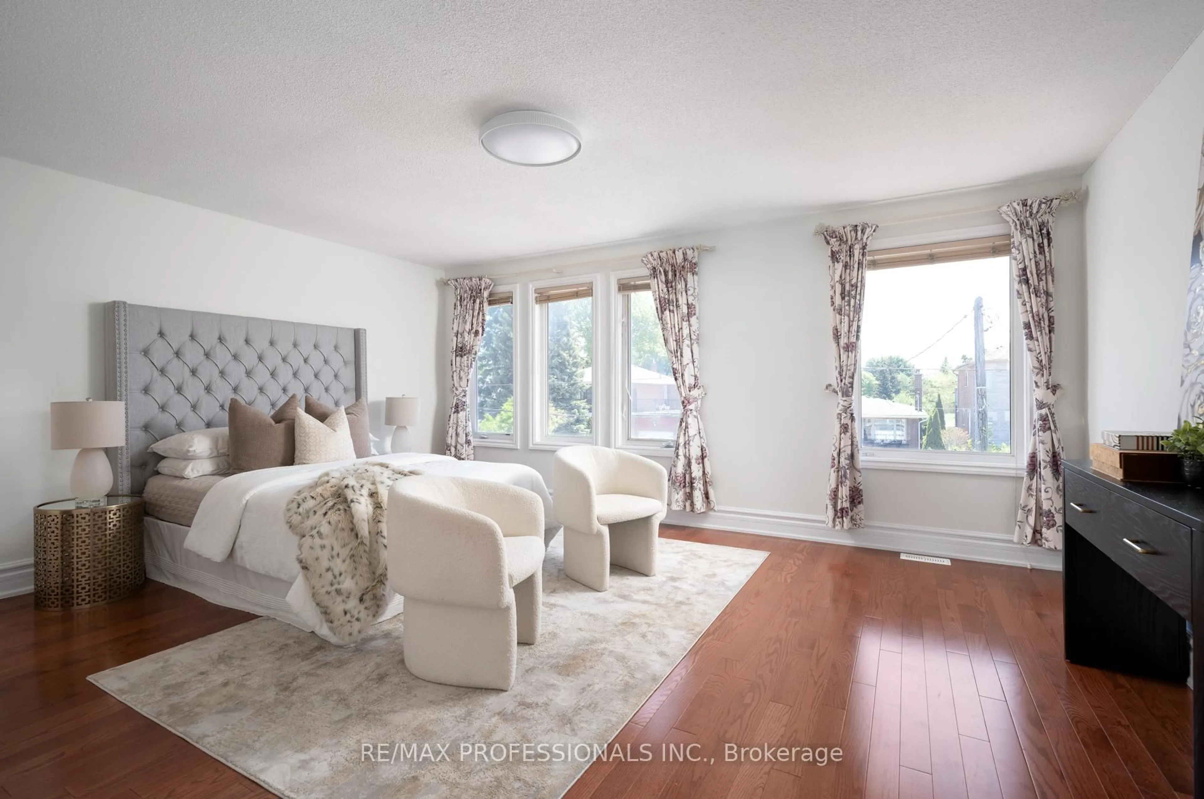 Bedroom with bed, wood/laminate floor for 84 Harding Ave, Toronto Ontario M6M 3A5