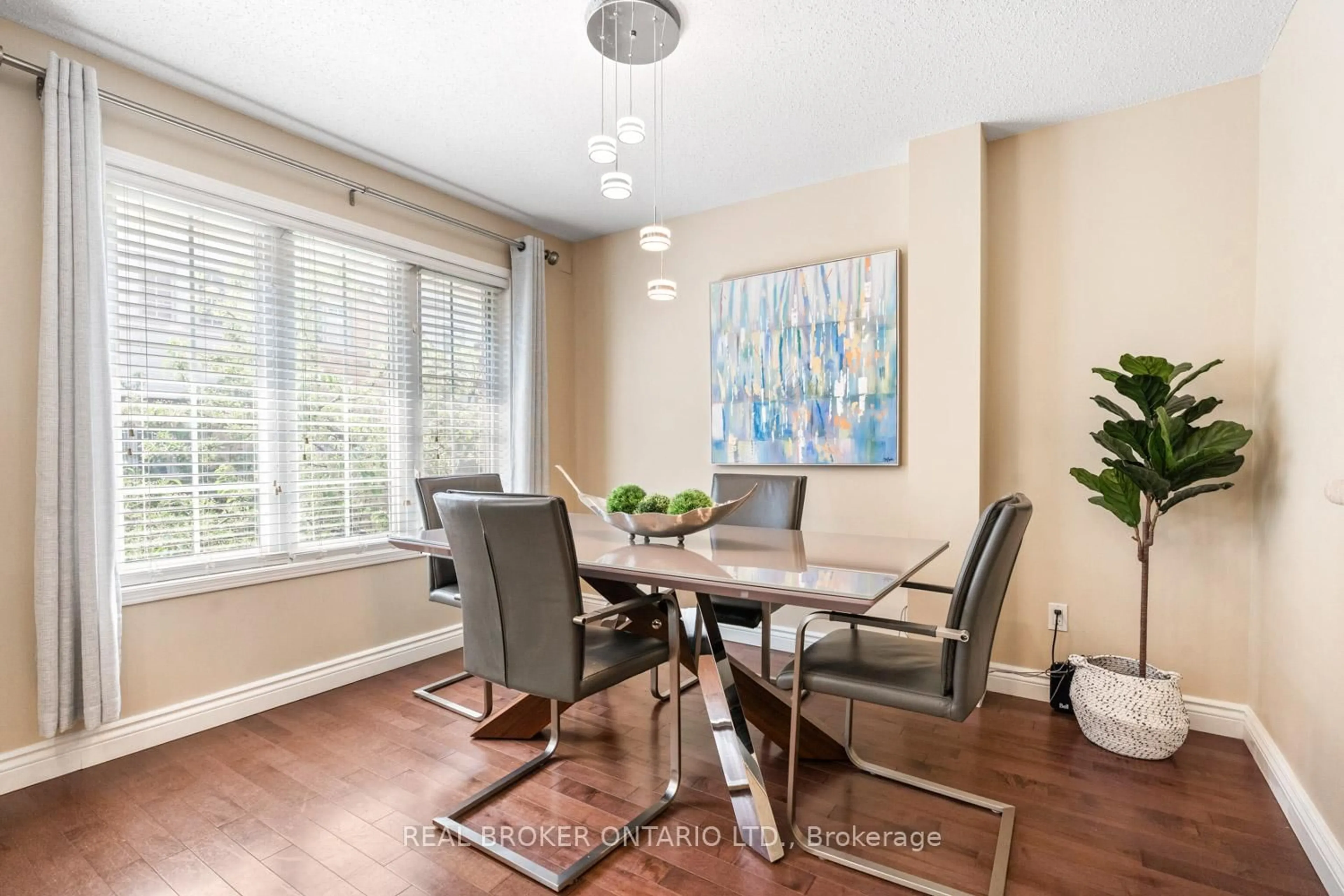 Dining room, wood/laminate floor for 25 West Deane Park Dr #7, Toronto Ontario M9B 2R5