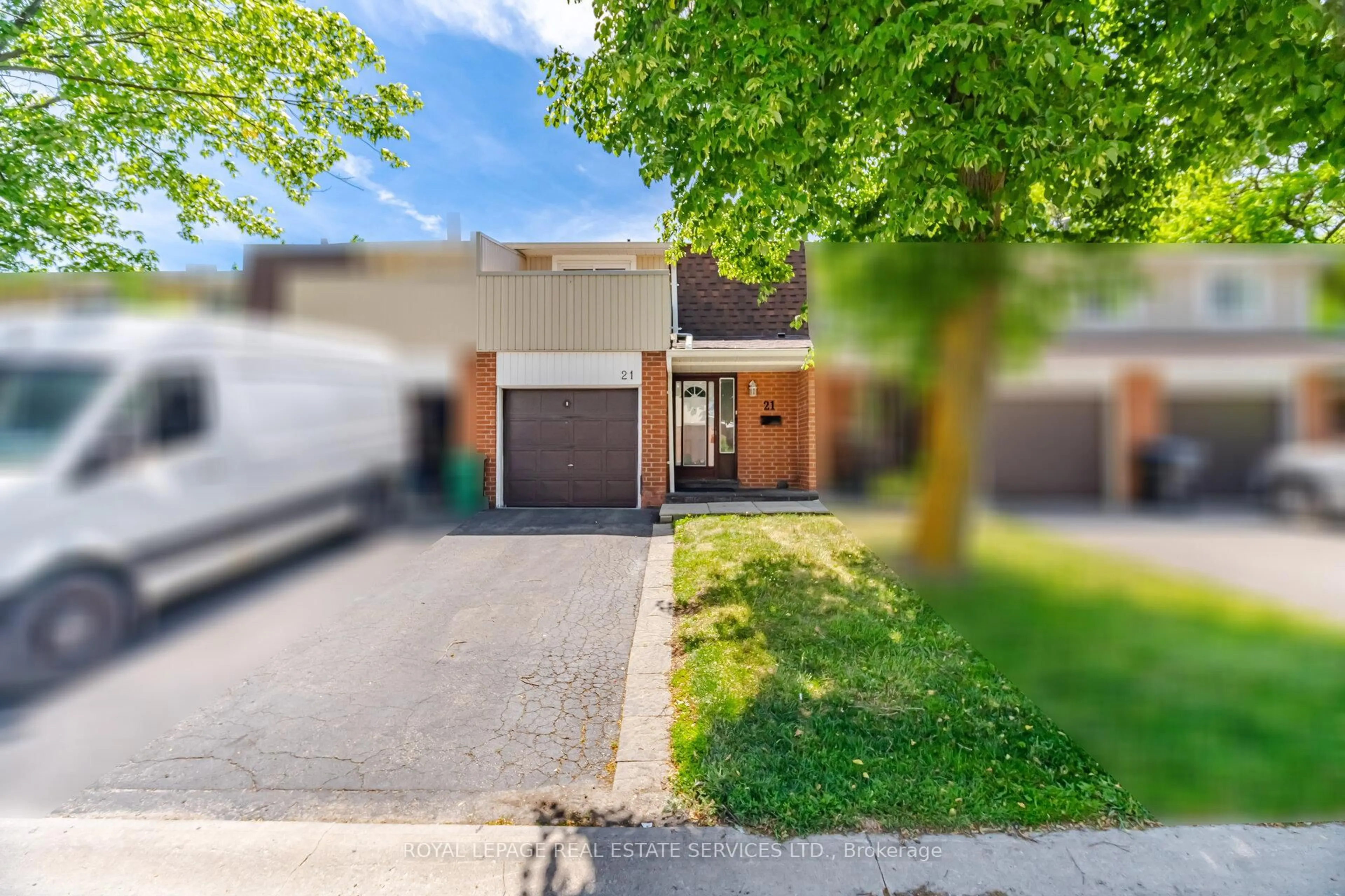 A pic from outside/outdoor area/front of a property/back of a property/a pic from drone, street for 345 Meadows Blvd #21, Mississauga Ontario L4Z 1G5