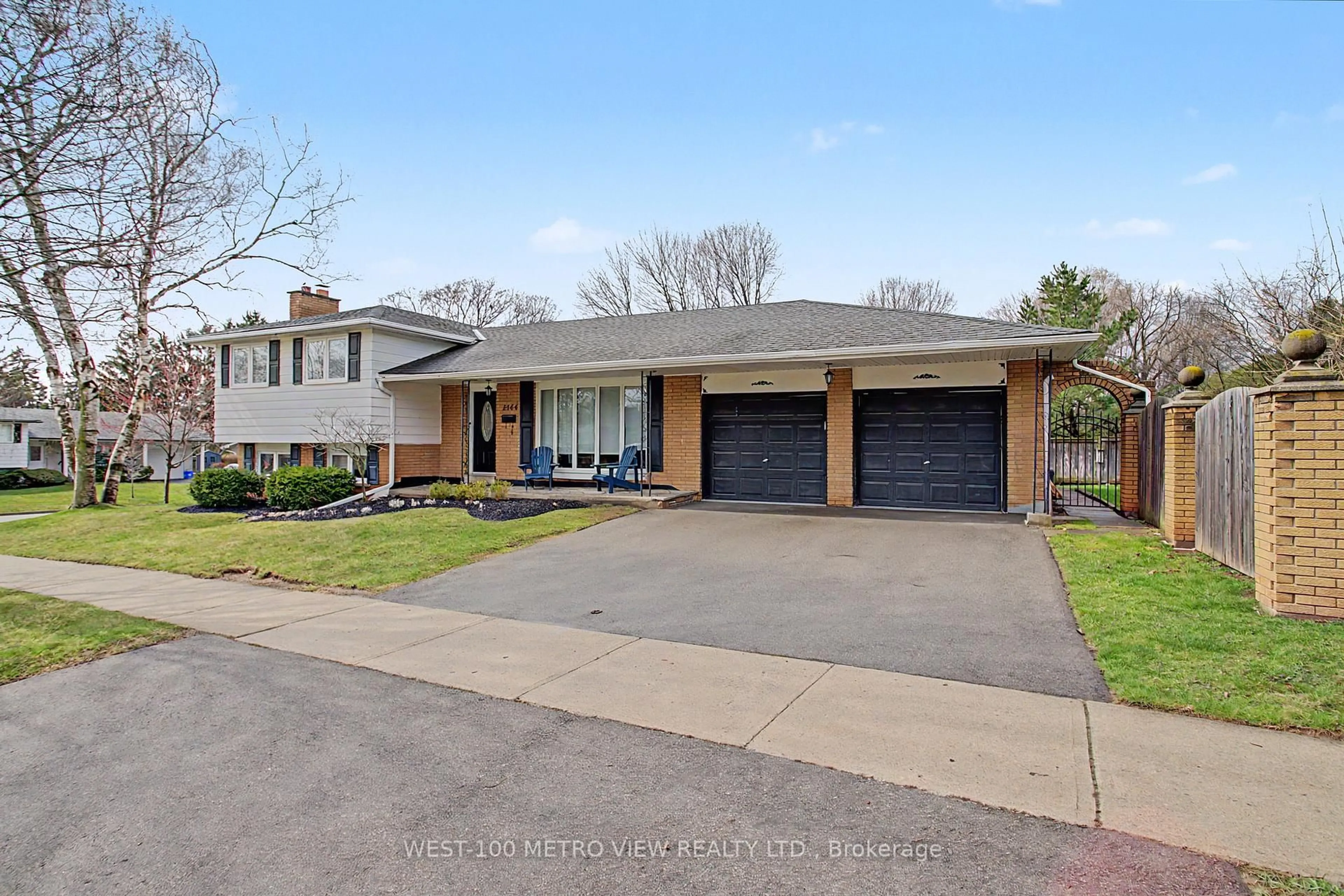 Home with brick exterior material, street for 2144 Sandringham Dr, Burlington Ontario L7P 1T9