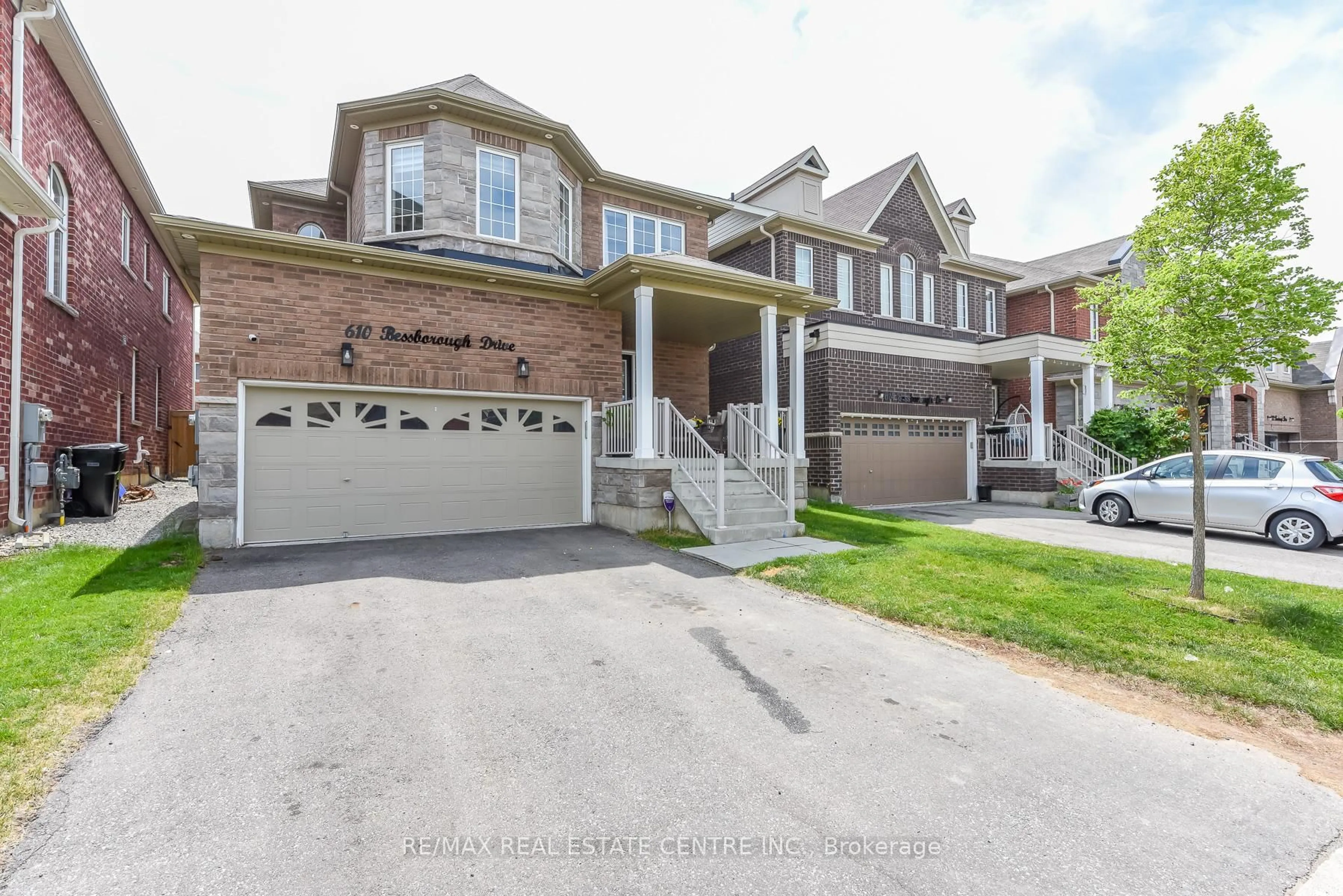 Home with brick exterior material, street for 610 bESSBOROUGH Dr, Milton Ontario L9T 7V2