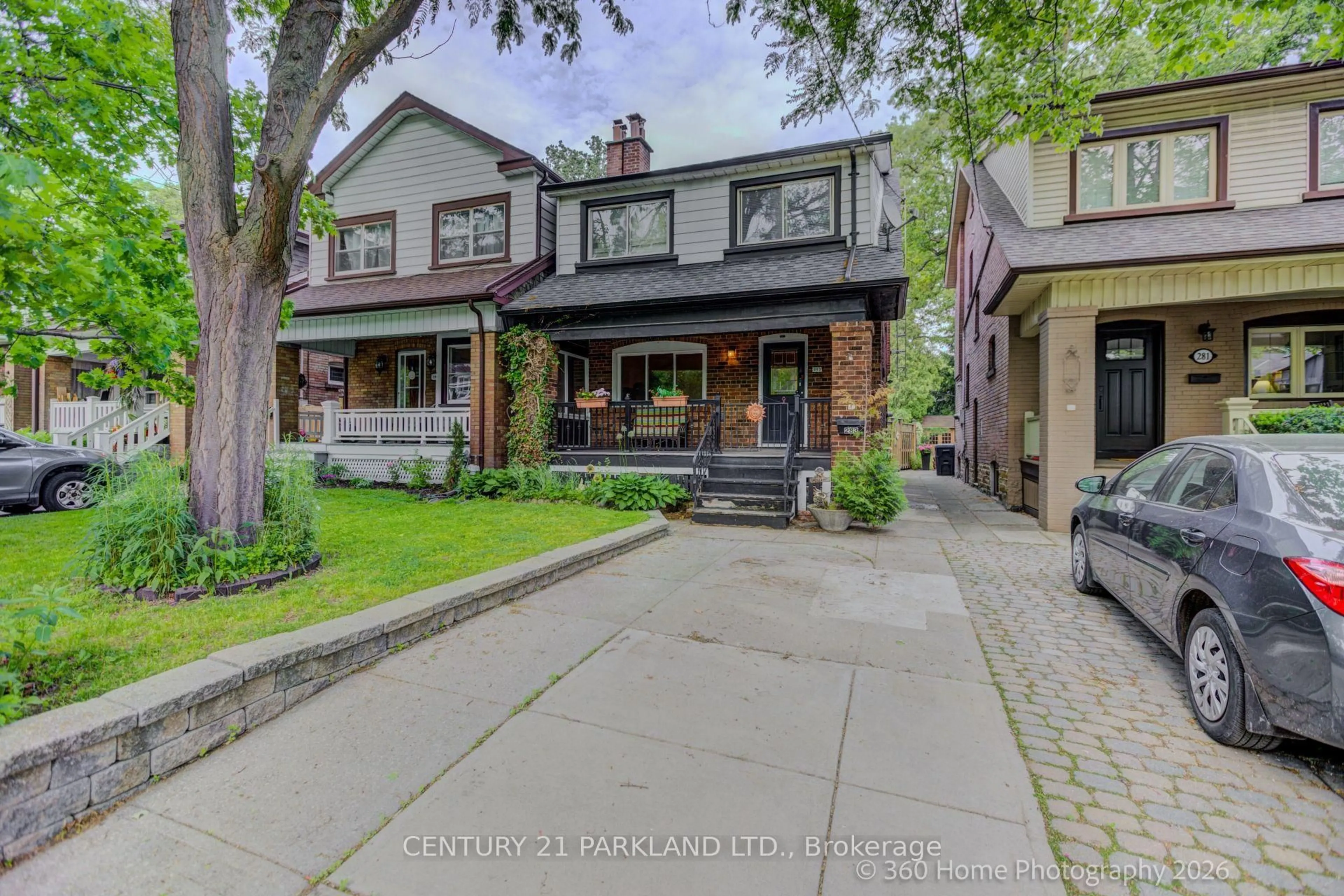 Home with brick exterior material, street for 283 Willard Ave, Toronto Ontario M6S 3R1