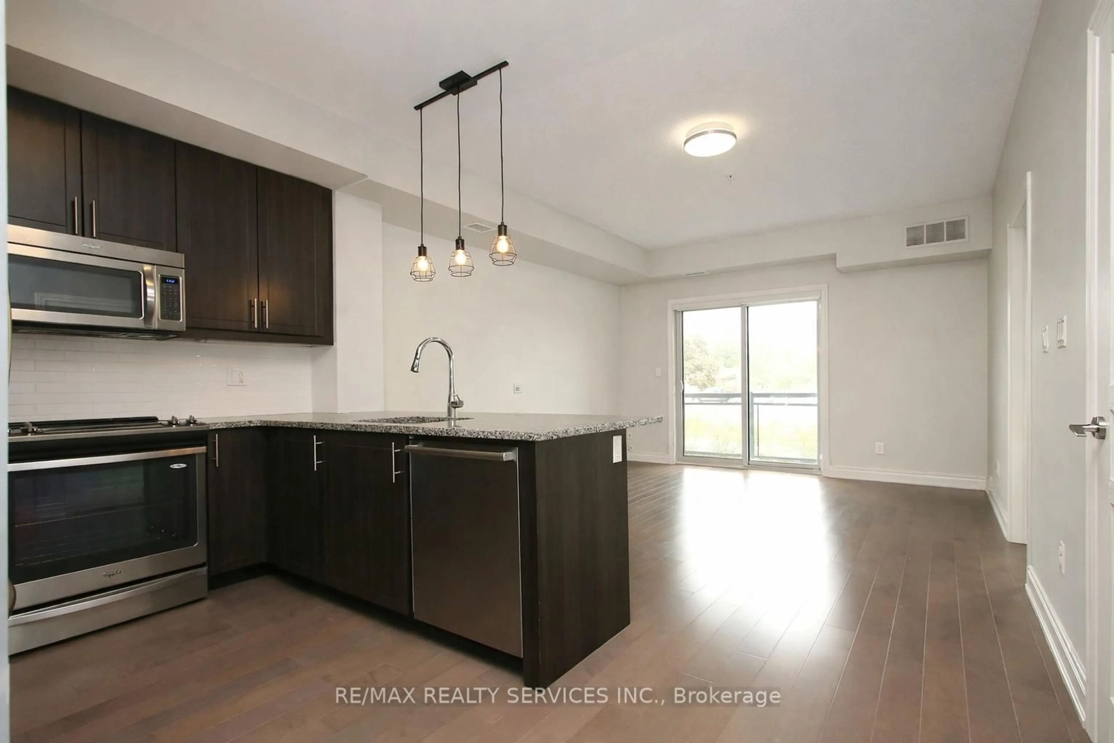 Open concept kitchen, unknown for 3170 Erin Mills Pkwy #133, Mississauga Ontario L5L 0B6