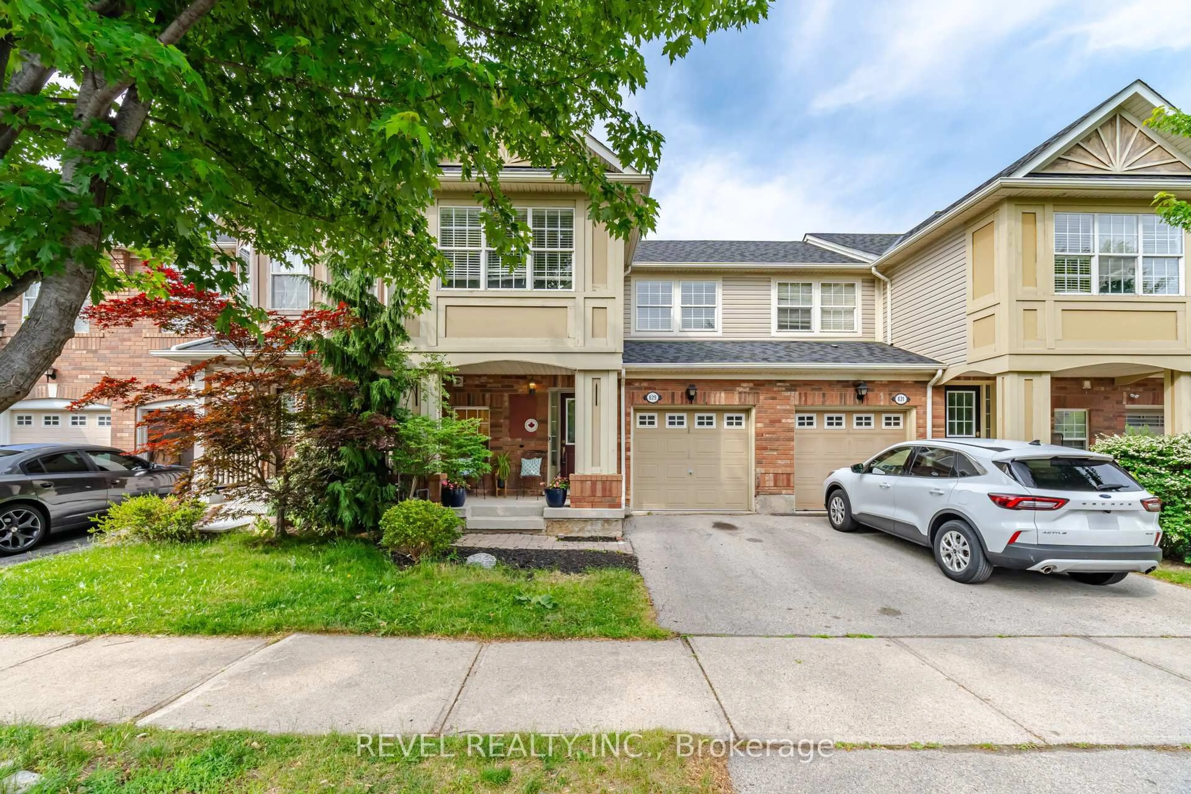 Home with brick exterior material, street for 629 Porter Way, Milton Ontario L9T 5W2
