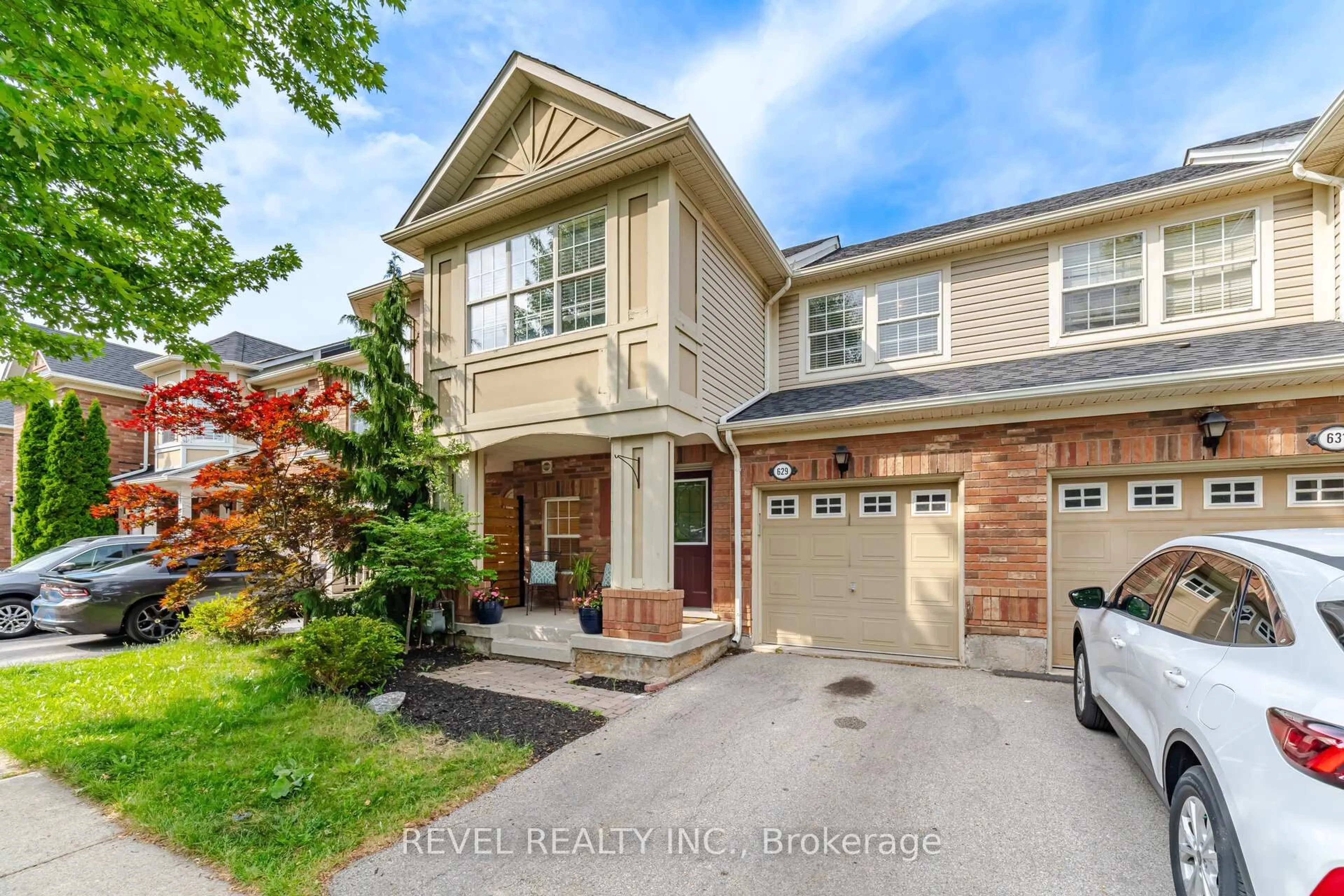 Home with brick exterior material, street for 629 Porter Way, Milton Ontario L9T 5W2