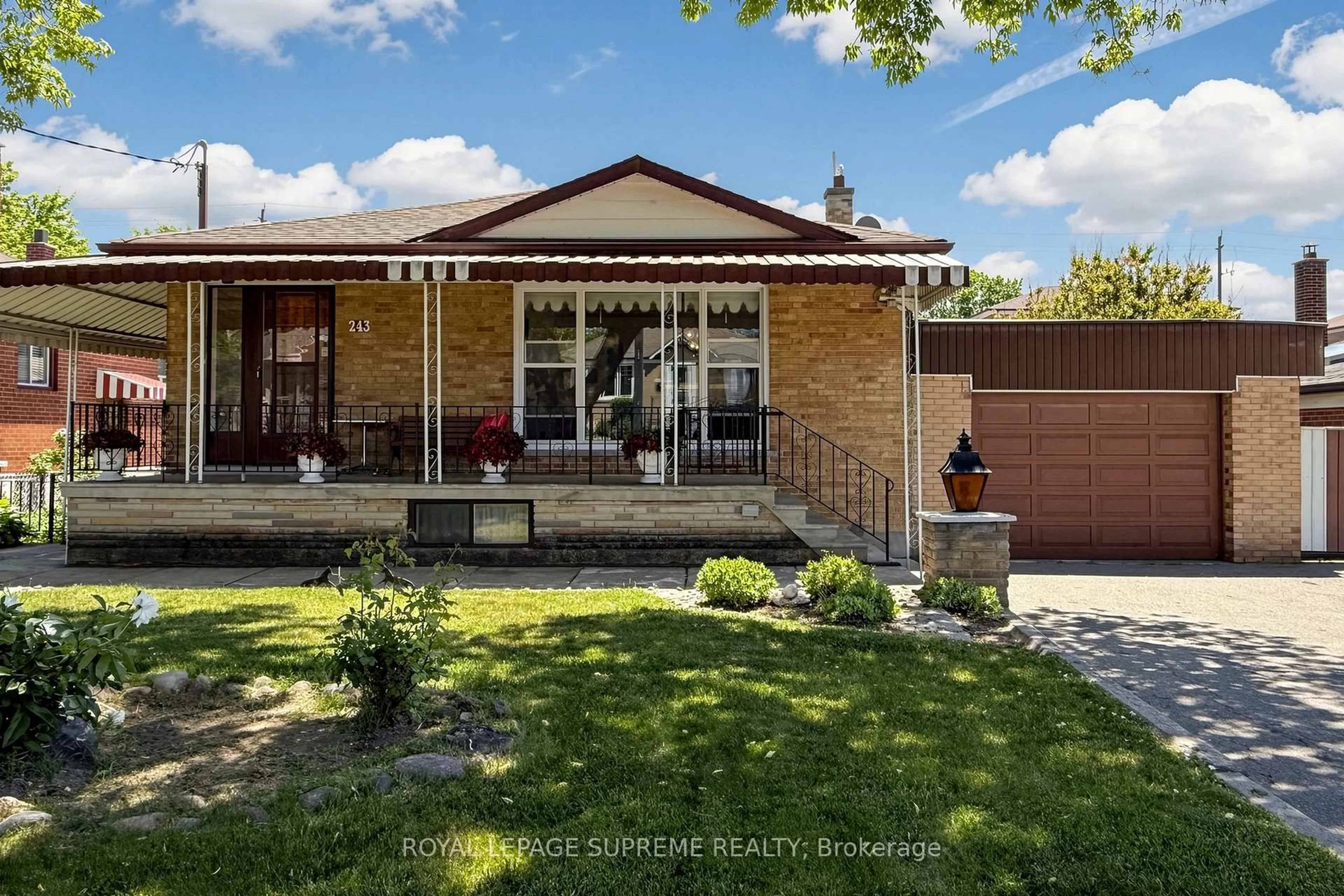 Home with brick exterior material, street for 243 Epsom Downs Dr, Toronto Ontario M3M 1T3