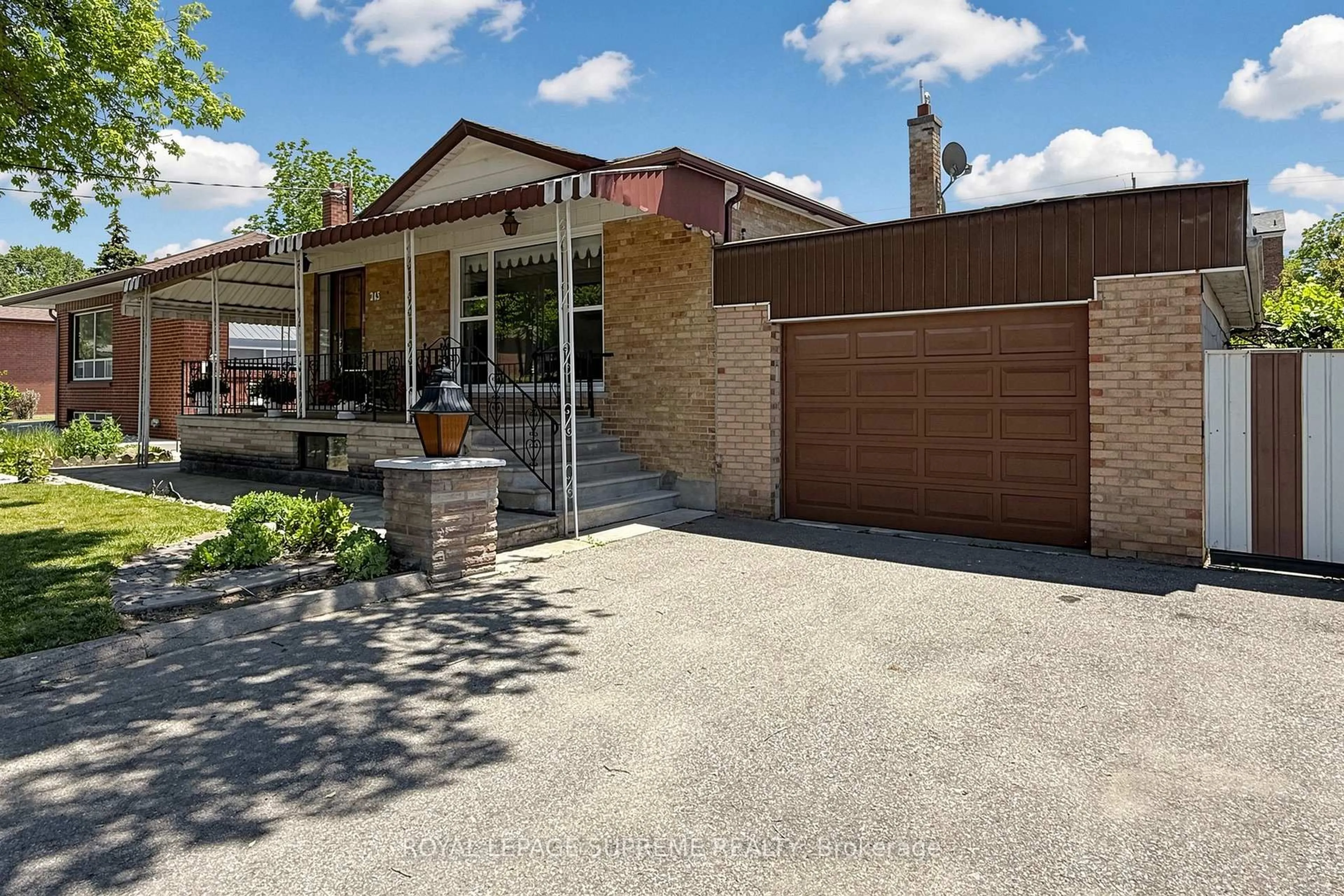 Home with brick exterior material, street for 243 Epsom Downs Dr, Toronto Ontario M3M 1T3