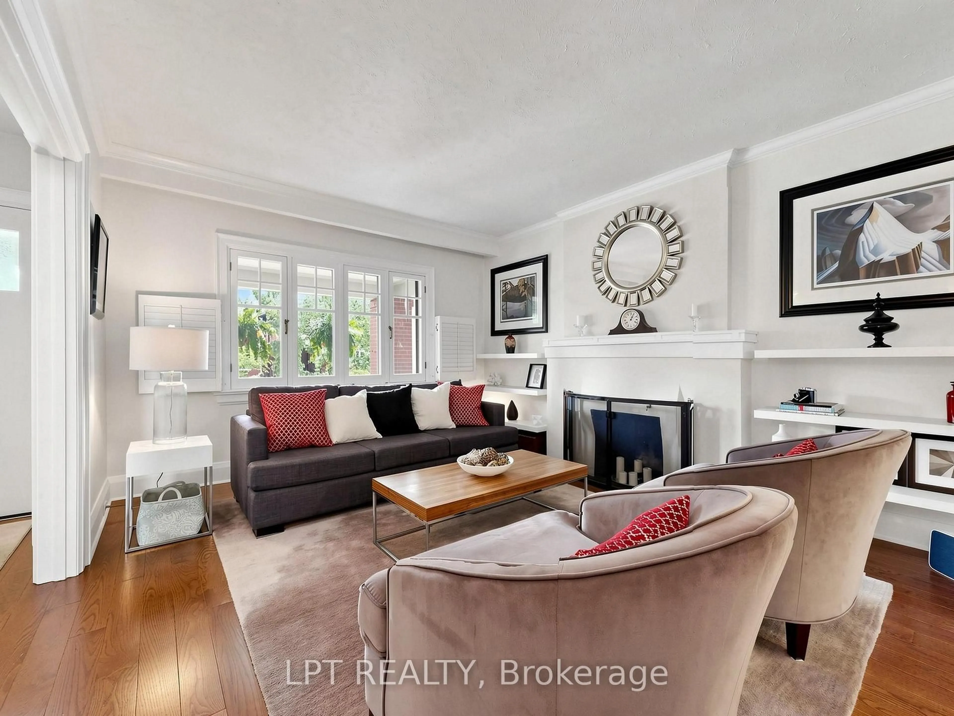 Living room with furniture, wood/laminate floor for 465 Durie St, Toronto Ontario M6S 3G6