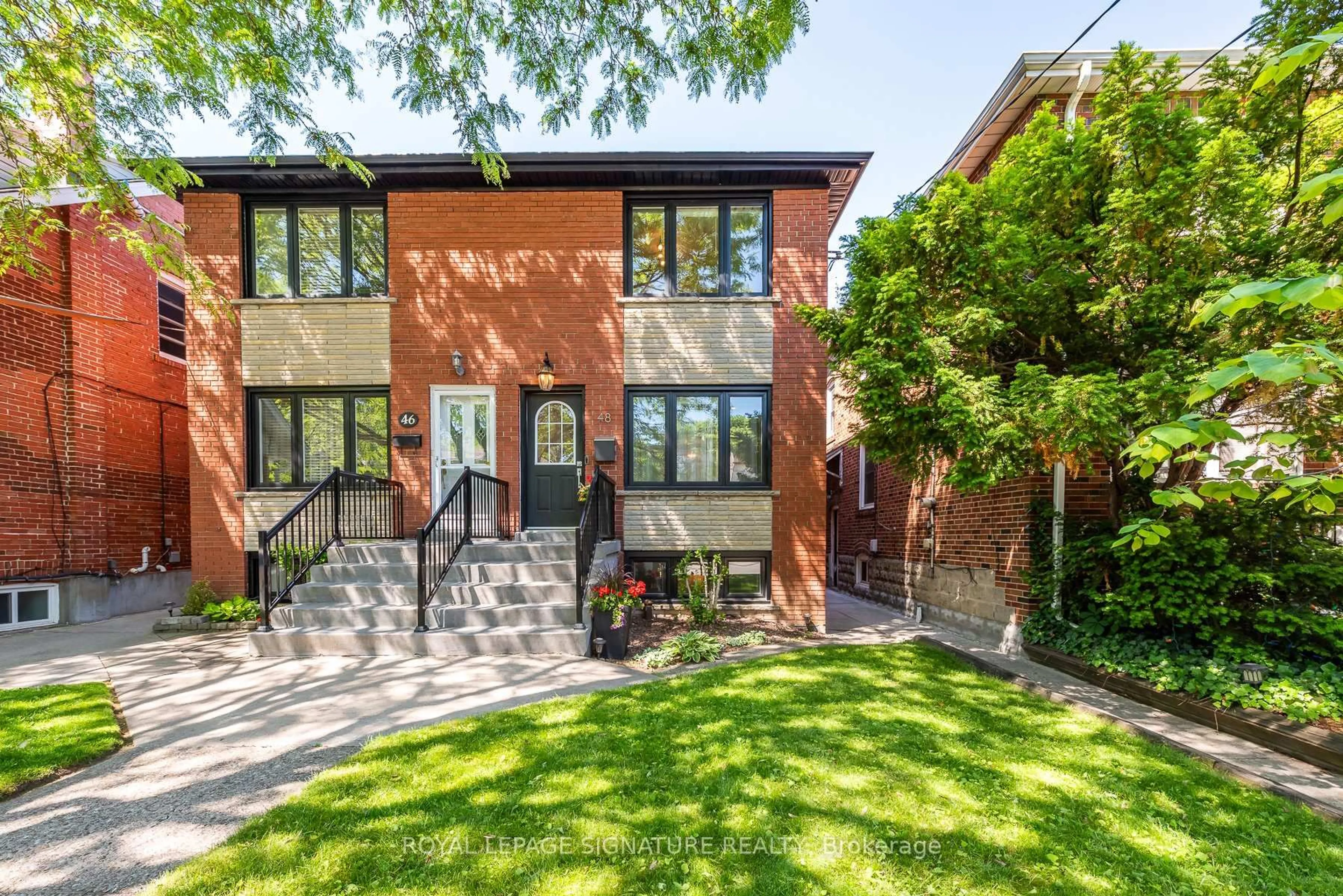 Home with brick exterior material, street for 48 McRoberts Ave, Toronto Ontario M6E 4P4