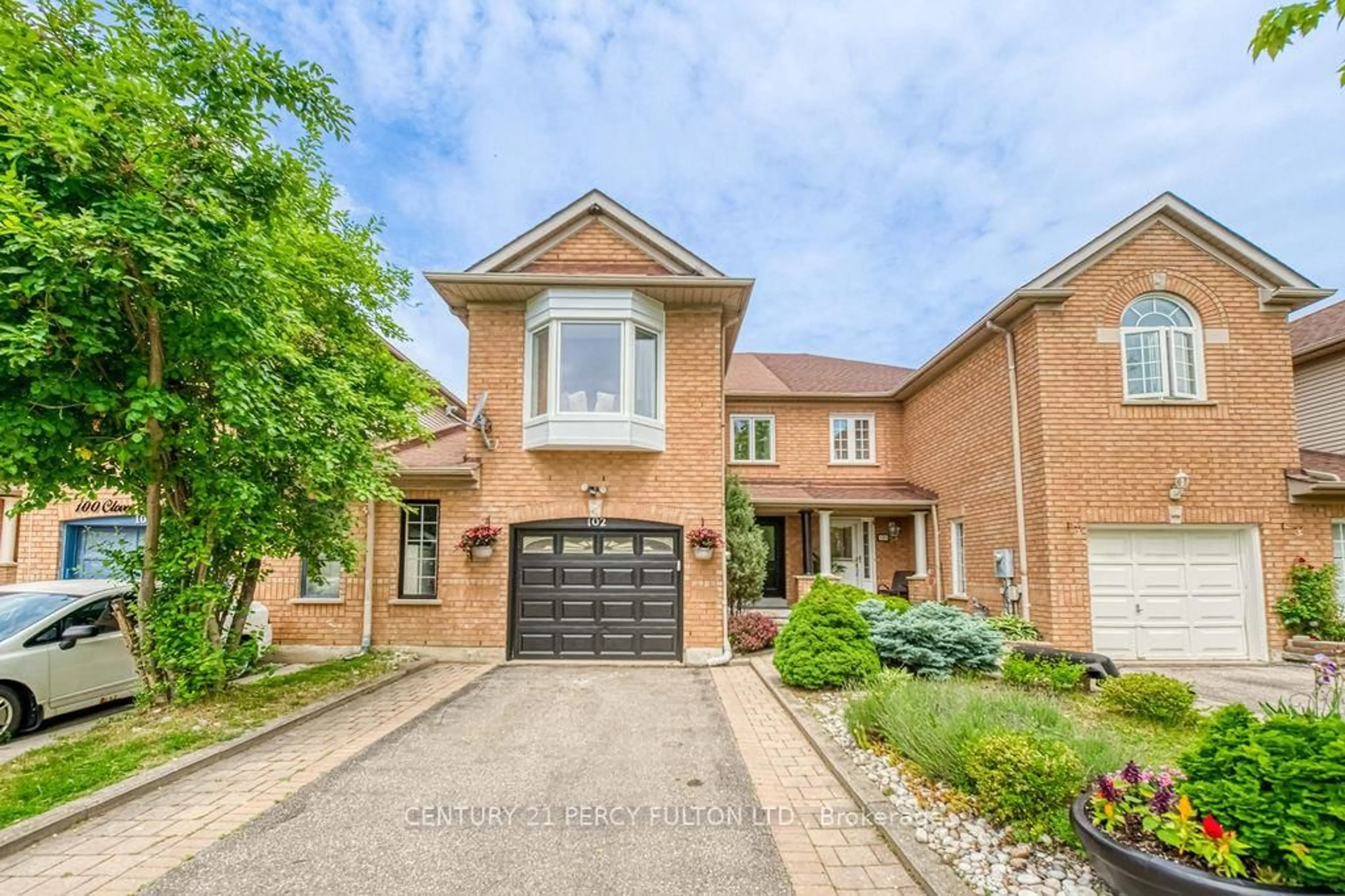 Home with brick exterior material, street for 102 Clover Bloom Rd, Brampton Ontario L6R 1S6
