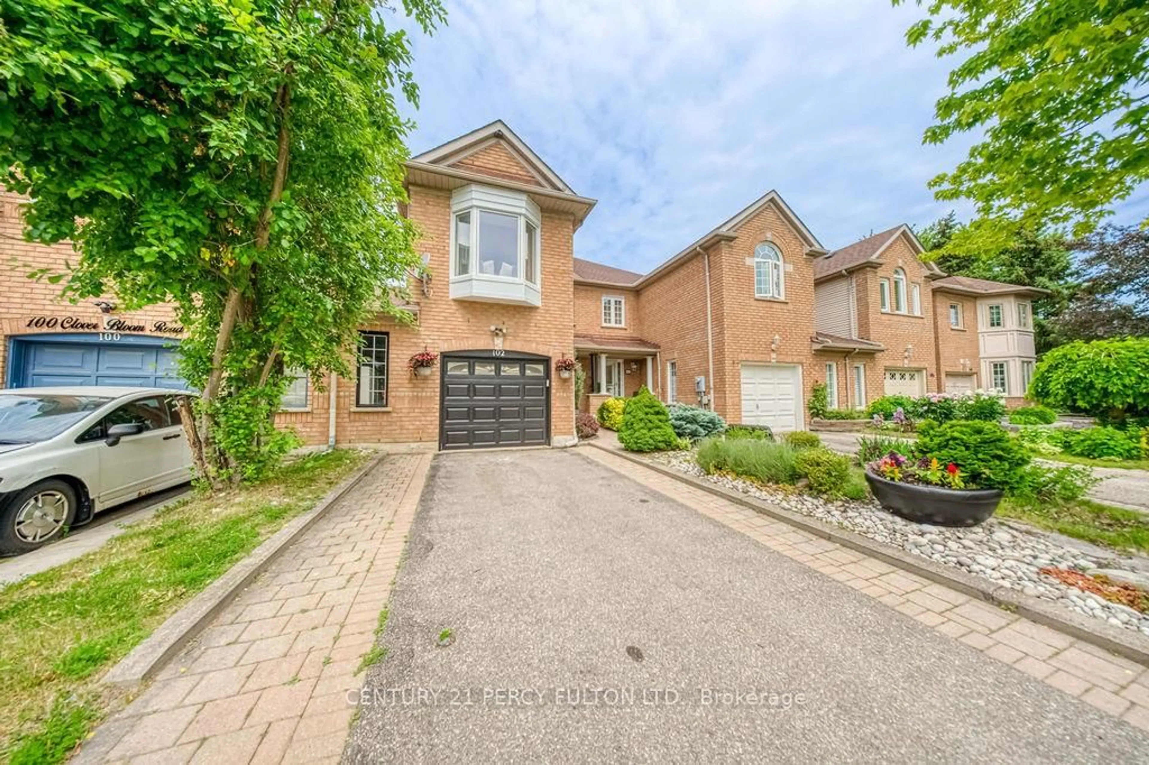 Home with brick exterior material, street for 102 Clover Bloom Rd, Brampton Ontario L6R 1S6
