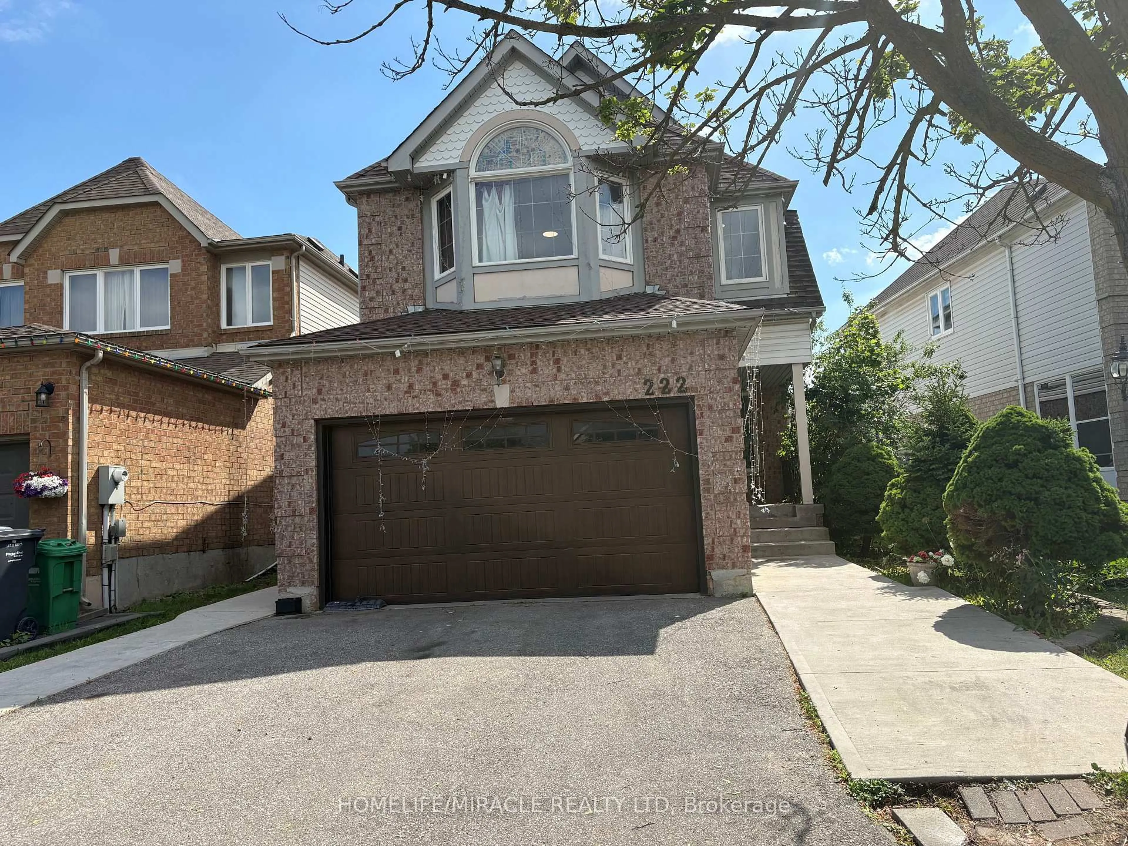 Home with brick exterior material, street for 222 Sunforest Dr, Brampton Ontario L6Z 4S4