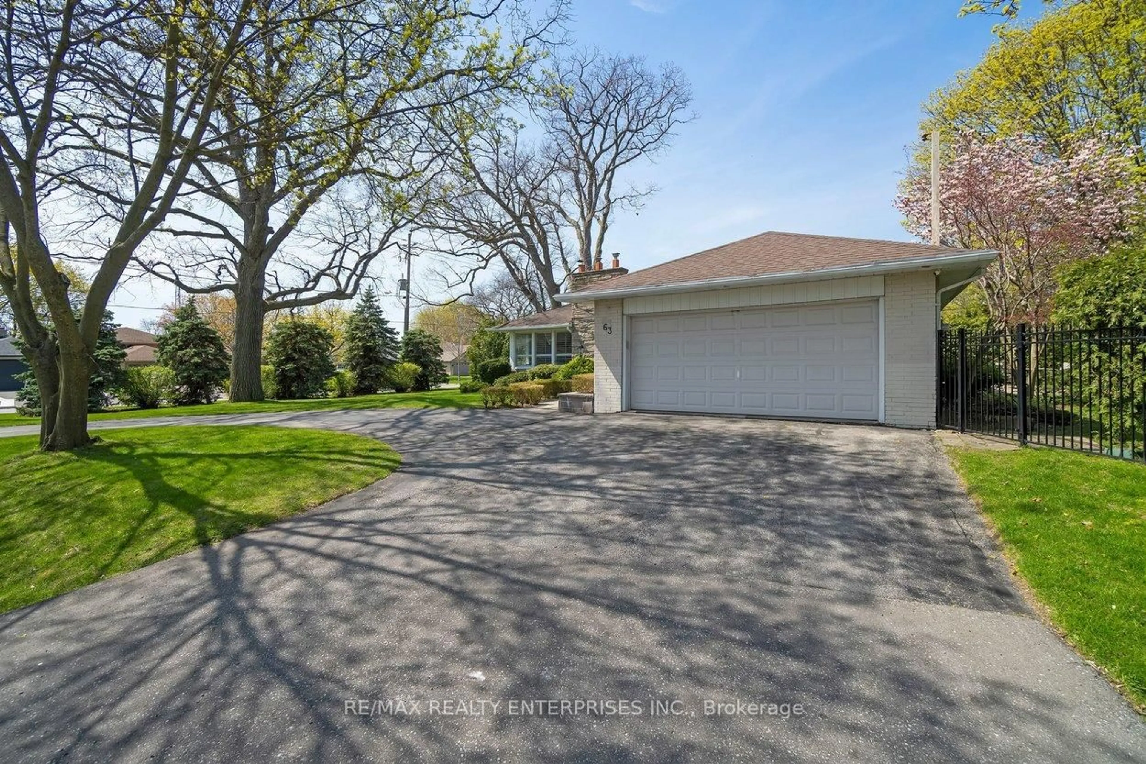 A pic from outside/outdoor area/front of a property/back of a property/a pic from drone, street for 63 Orkney Cres, Toronto Ontario M9A 2T6