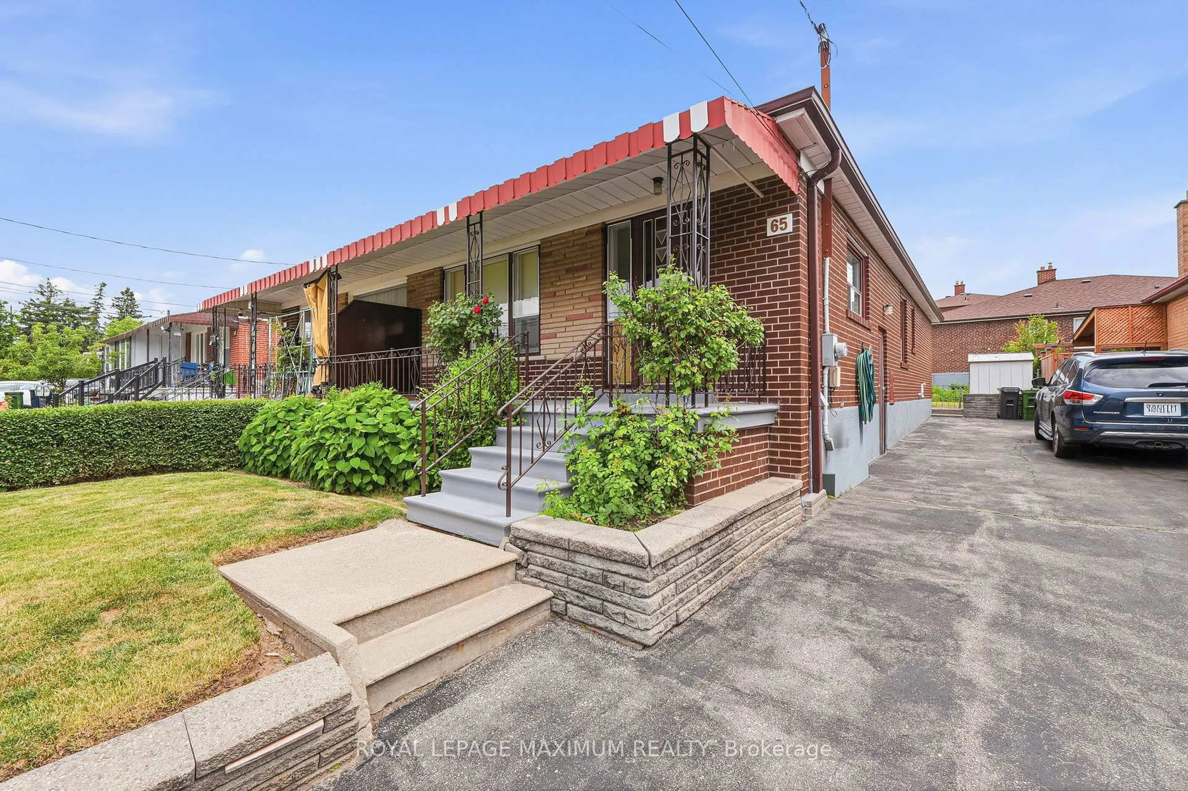 Home with brick exterior material, street for 65 Magellan Dr, Toronto Ontario M3L 1T4