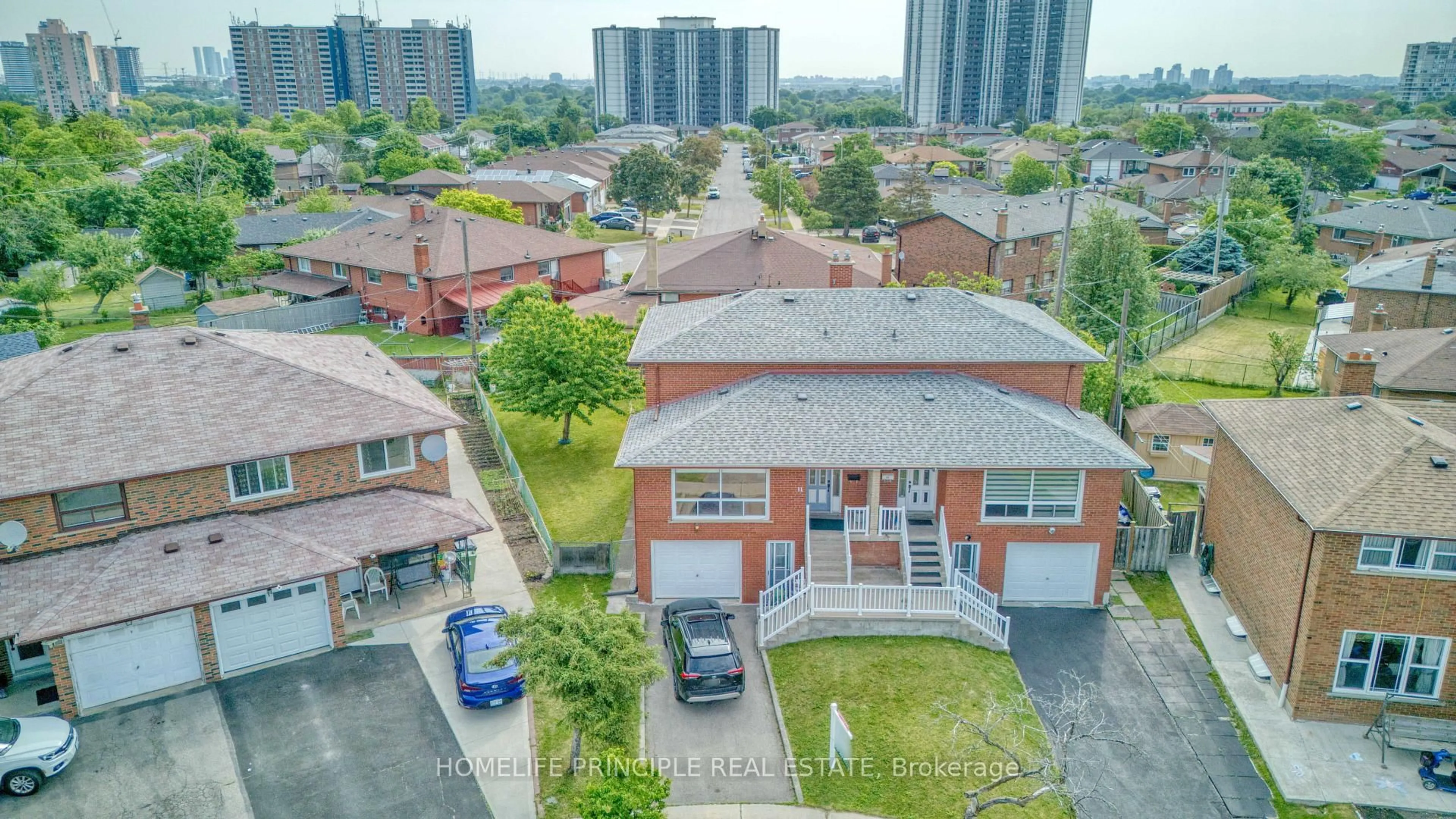 A pic from outside/outdoor area/front of a property/back of a property/a pic from drone, city buildings view from balcony for 11 Sheila Crt, Toronto Ontario M9V 3M4
