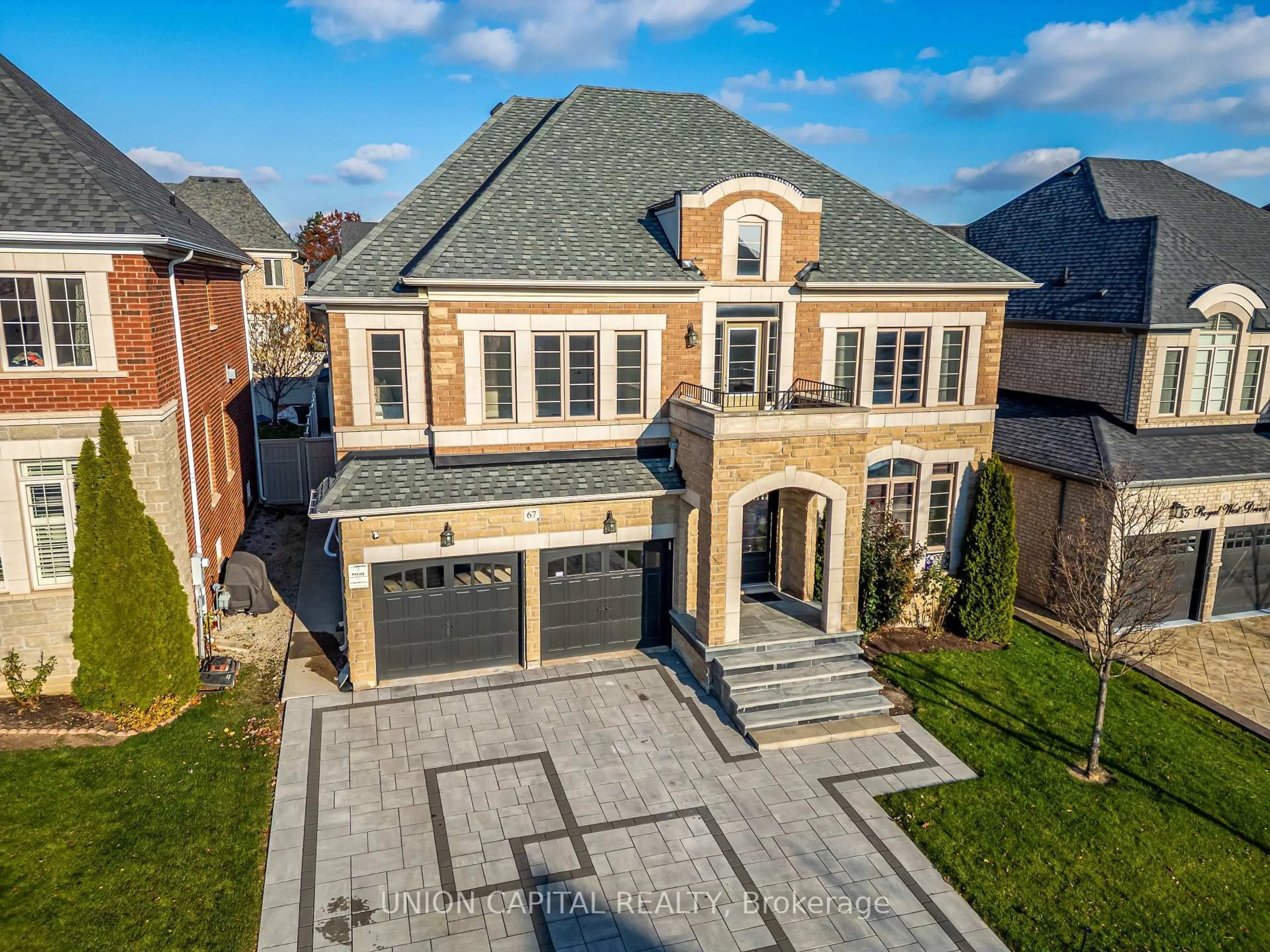 Home with brick exterior material, street for 67 Royal West Dr, Brampton Ontario L6X 0Z8