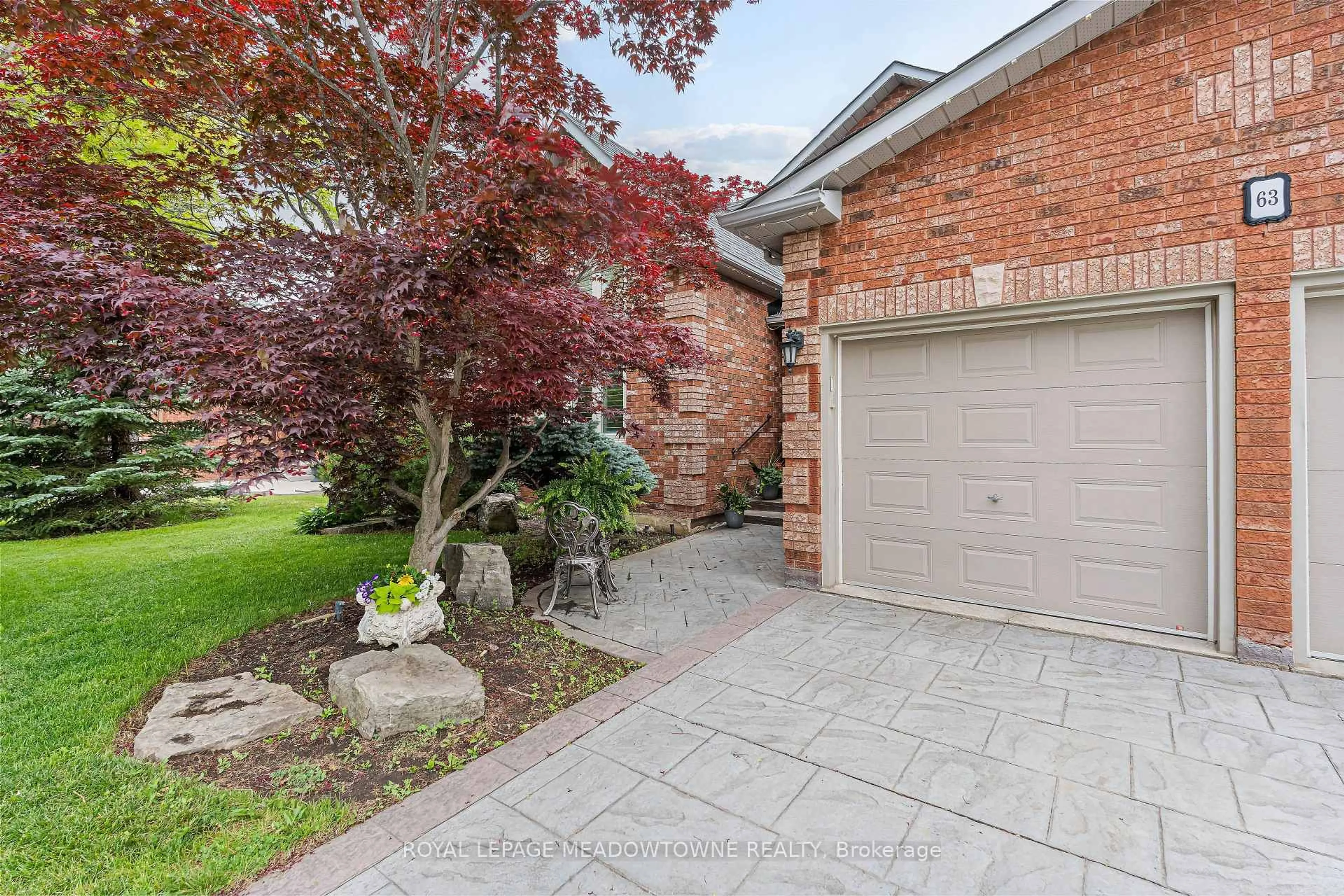 Home with brick exterior material, street for 63 Craig Cres, Halton Hills Ontario L7G 5L4