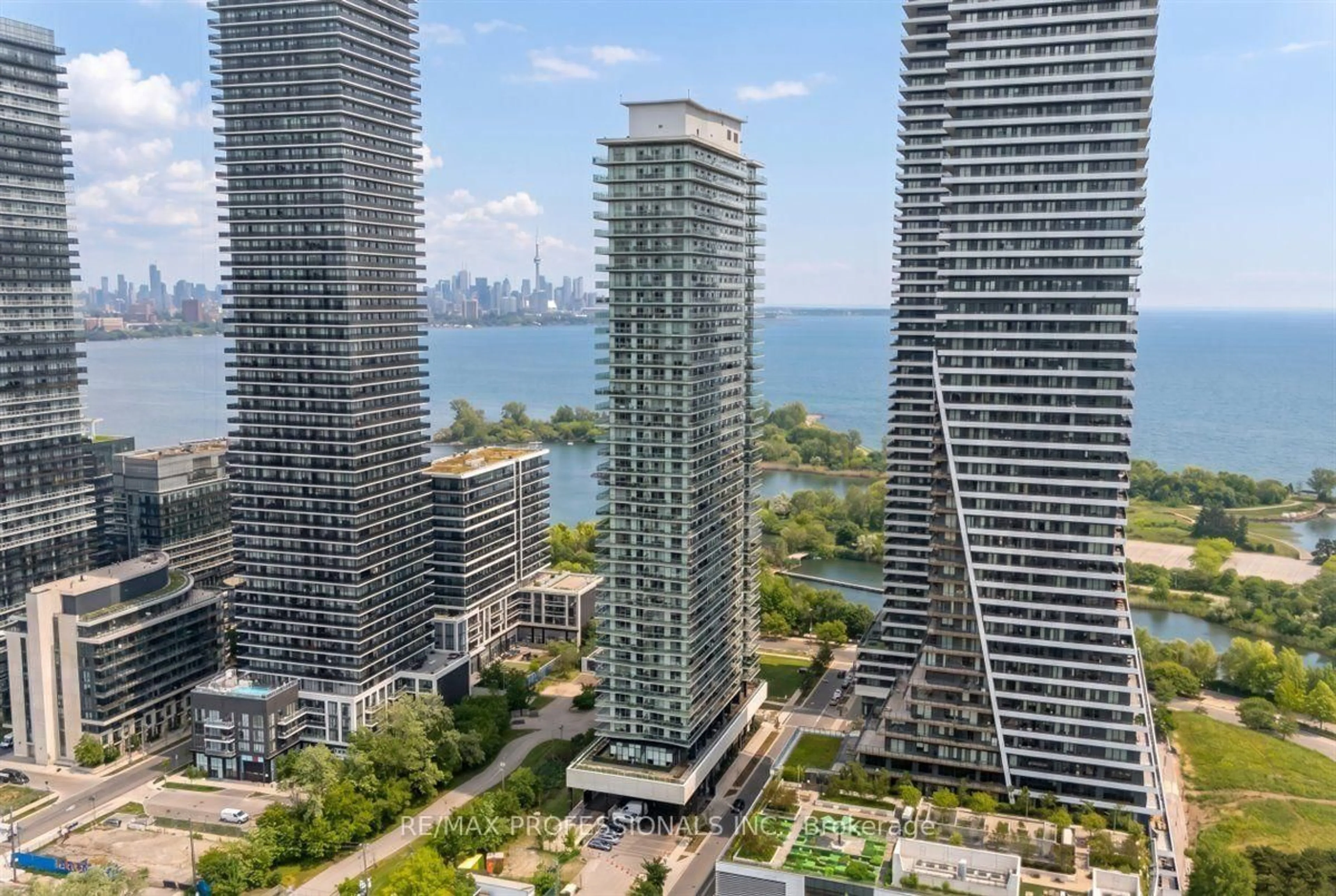 A pic from outside/outdoor area/front of a property/back of a property/a pic from drone, city buildings view from balcony for 33 Shore Breeze Dr #1310, Toronto Ontario M8V 0G1