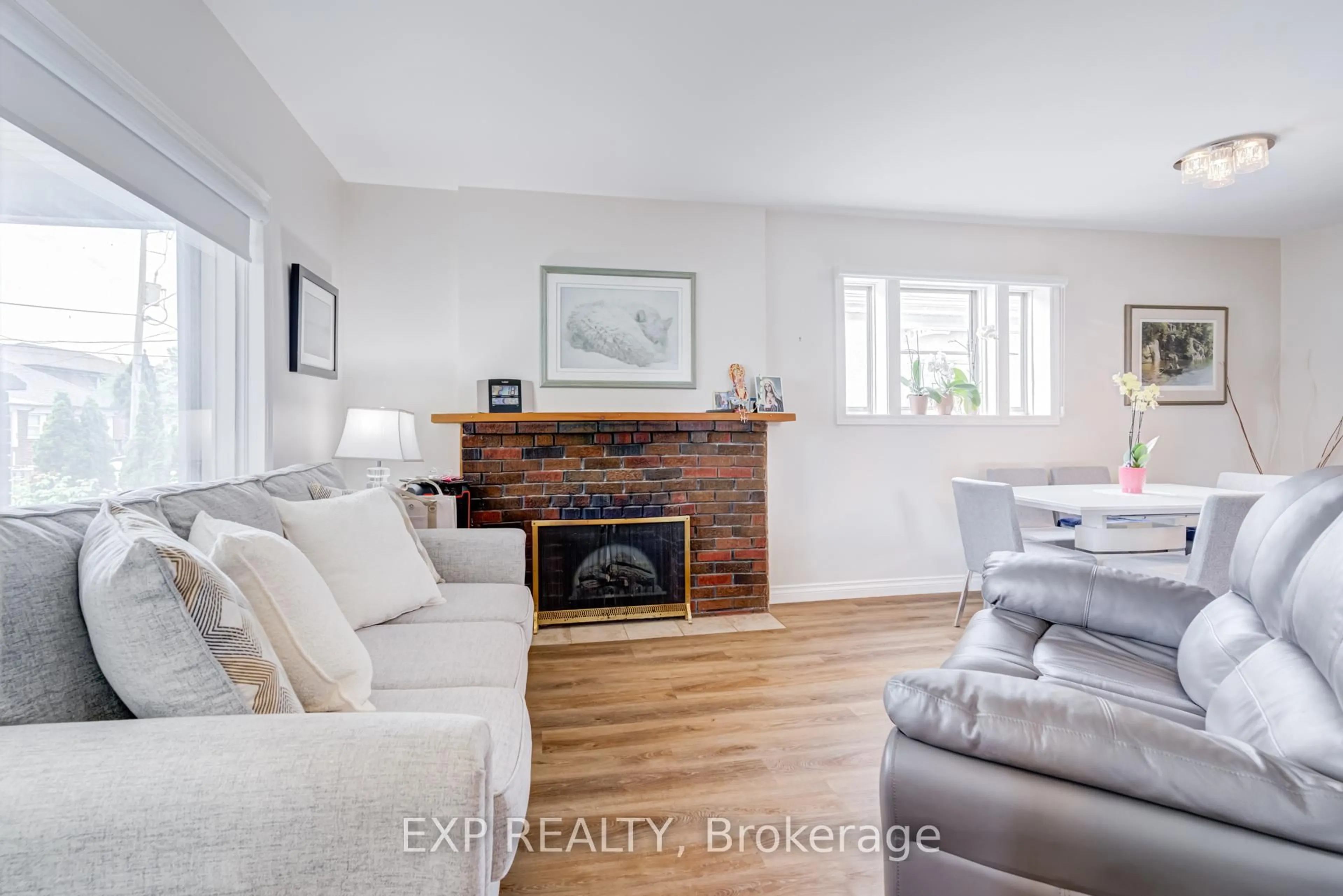 Living room with furniture, wood/laminate floor for 5 Laxis Ave, Toronto Ontario M6M 2K6