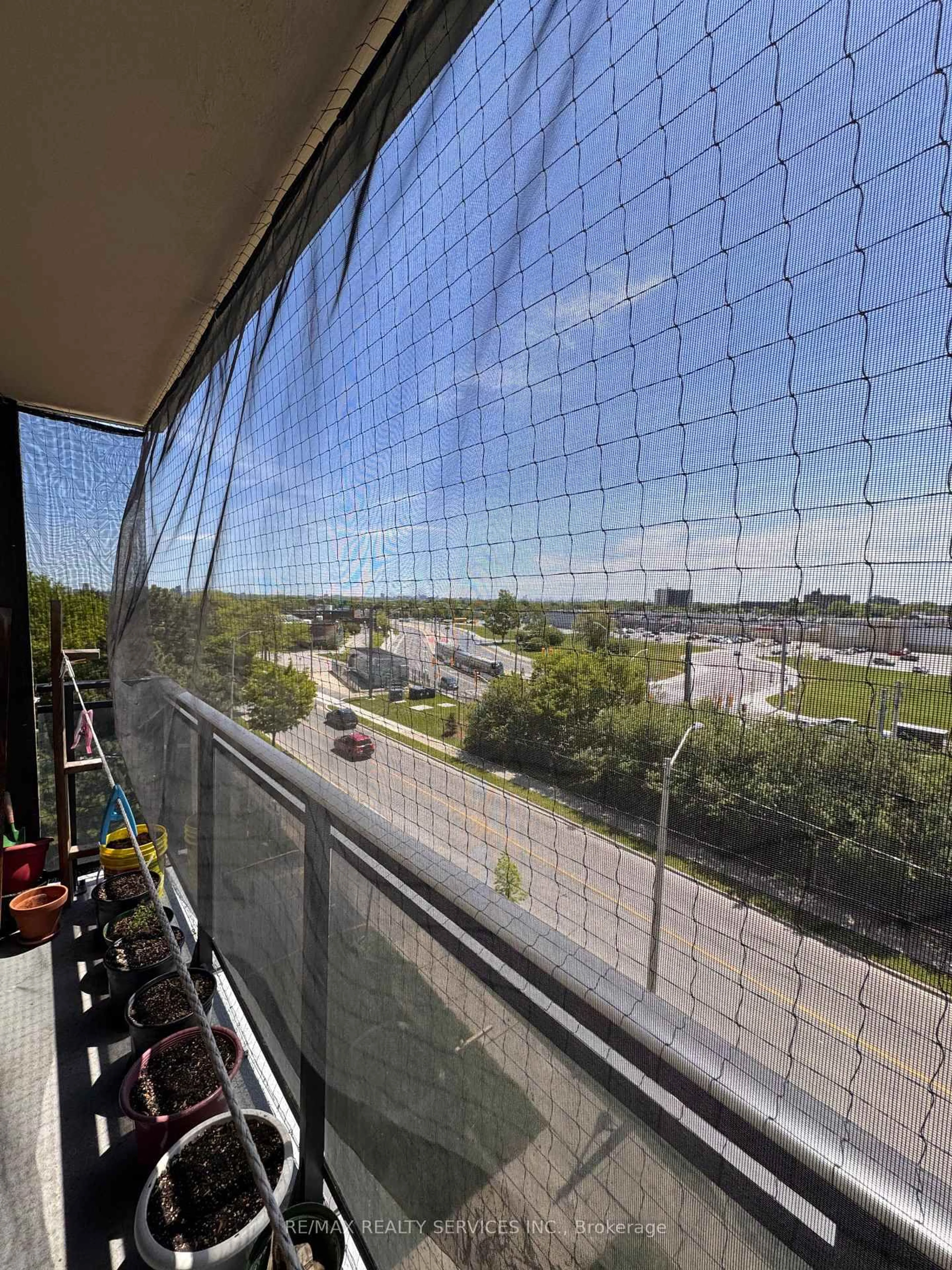 Balcony in the apartment, city buildings view from balcony for 60 Stevenson Rd #501, Toronto Ontario M9V 2B4