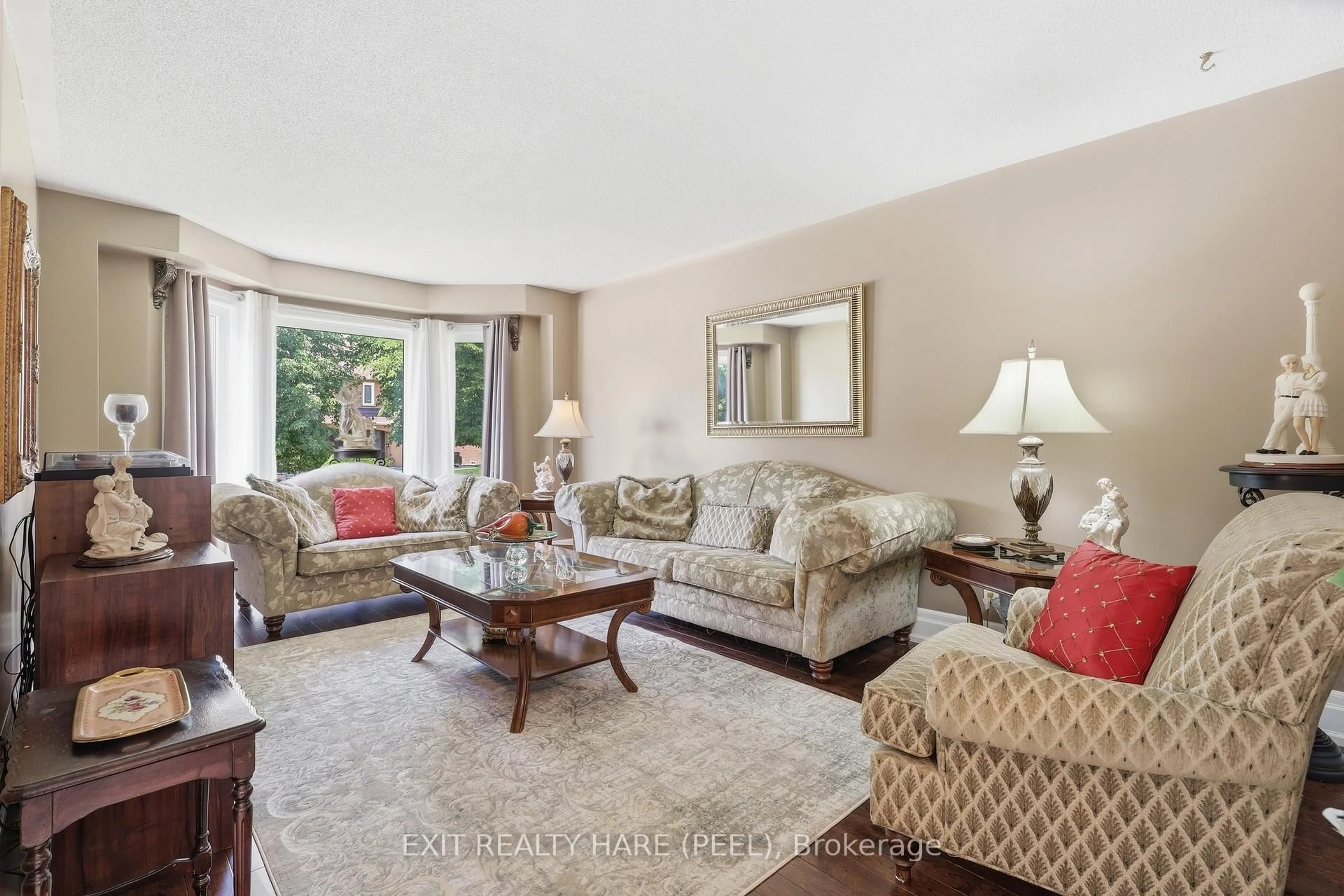 Living room with furniture, unknown for 14 Warrington Crt, Brampton Ontario L6W 4G7