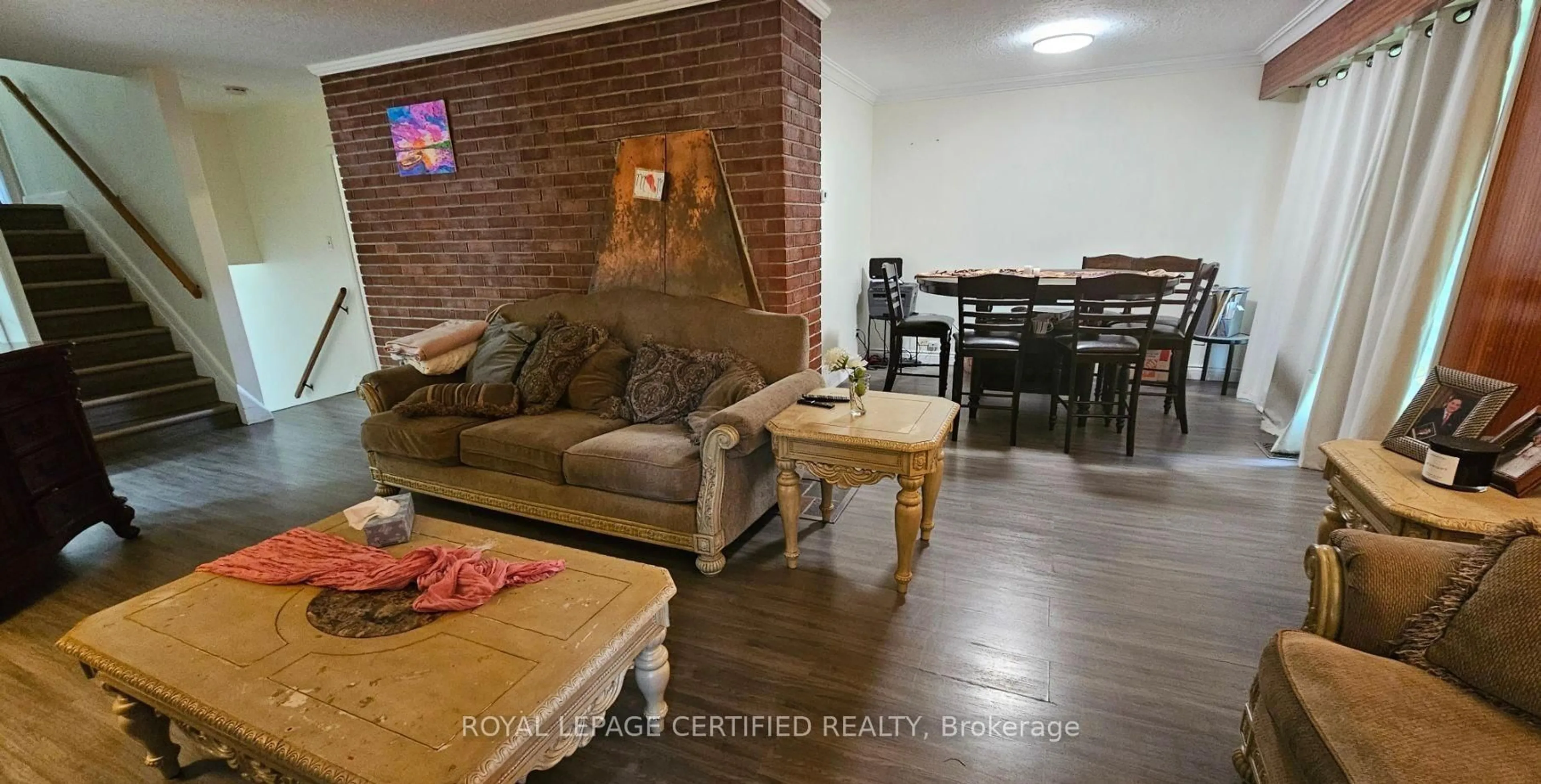 Living room with furniture, wood/laminate floor for 1373 Hixon St, Oakville Ontario L6L 1R9