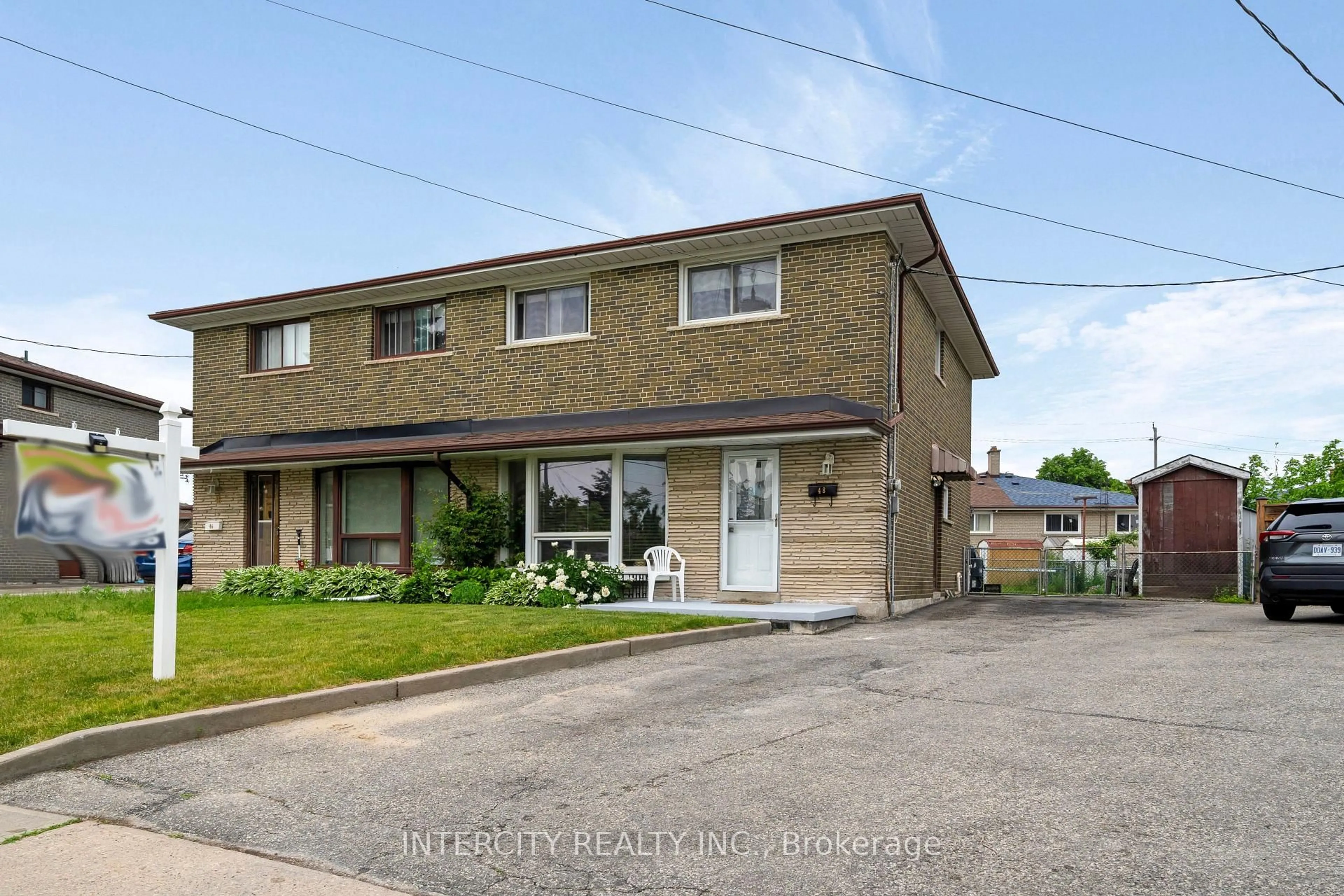 A pic from outside/outdoor area/front of a property/back of a property/a pic from drone, street for 48 Goldsboro Rd, Toronto Ontario M9L 1A7