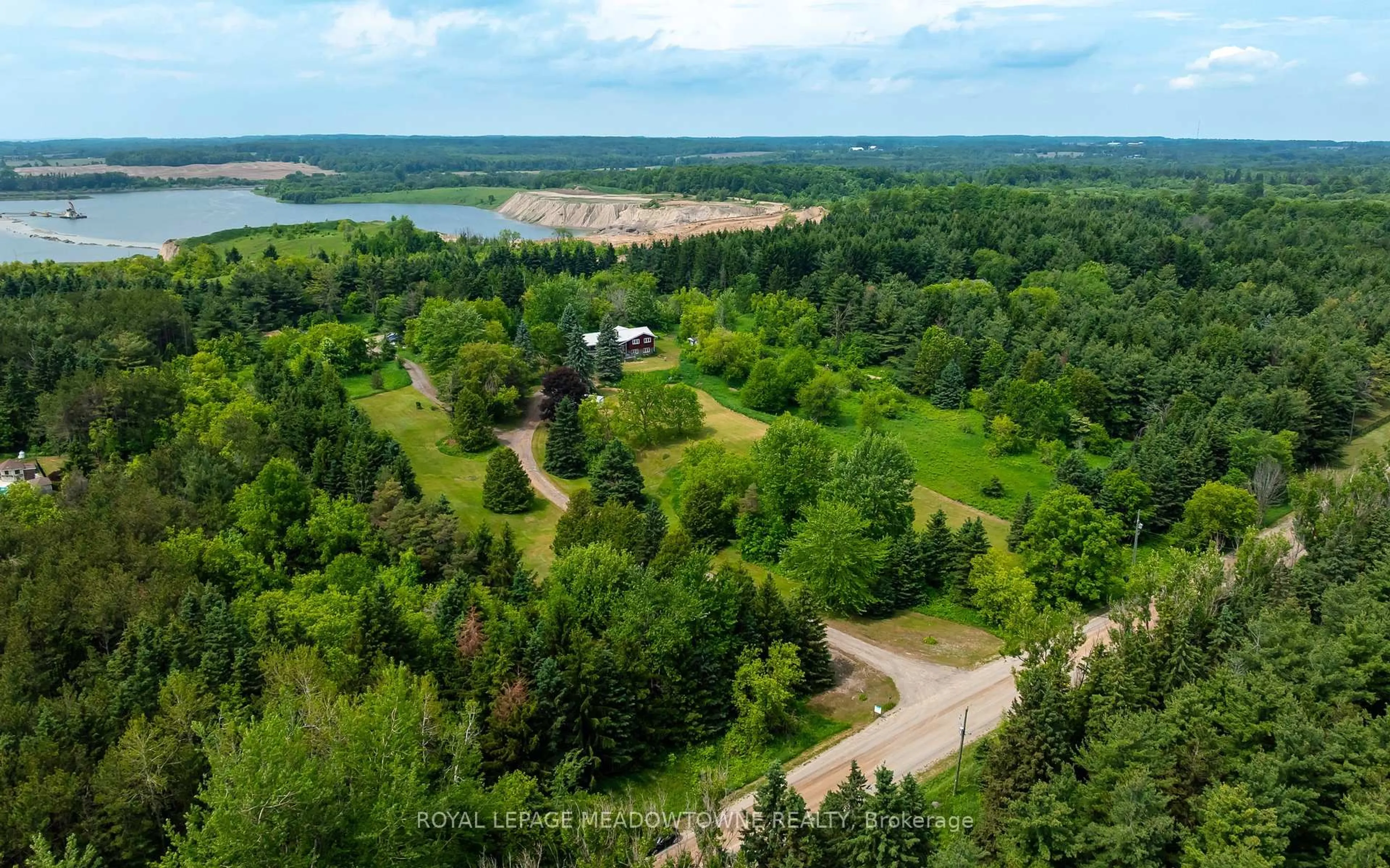 A pic from outside/outdoor area/front of a property/back of a property/a pic from drone, water/lake/river/ocean view for 3574 Escarpment Sdrd, Caledon Ontario L7K 1E7