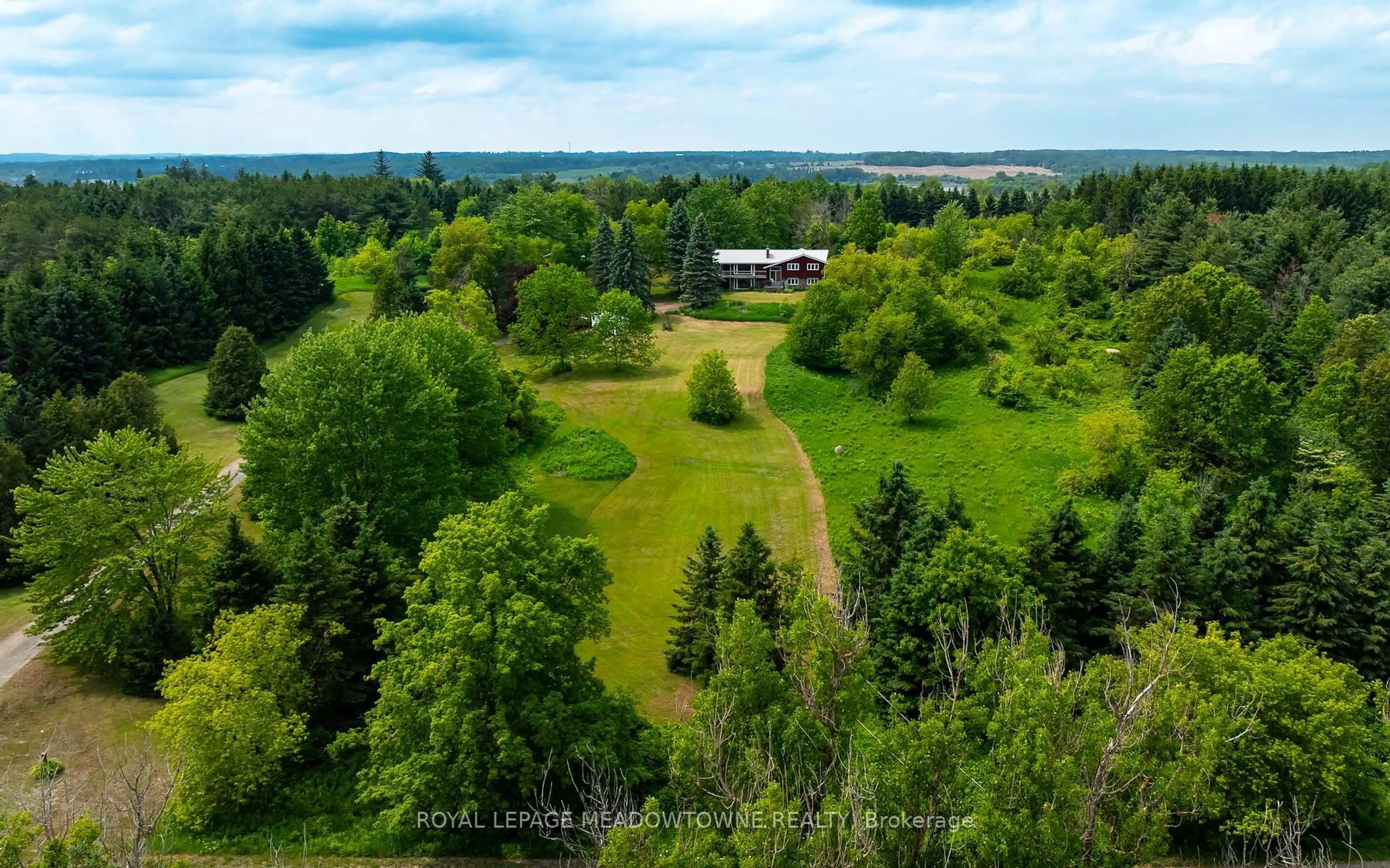 A pic from outside/outdoor area/front of a property/back of a property/a pic from drone, forest/trees view for 3574 Escarpment Sdrd, Caledon Ontario L7K 1E7