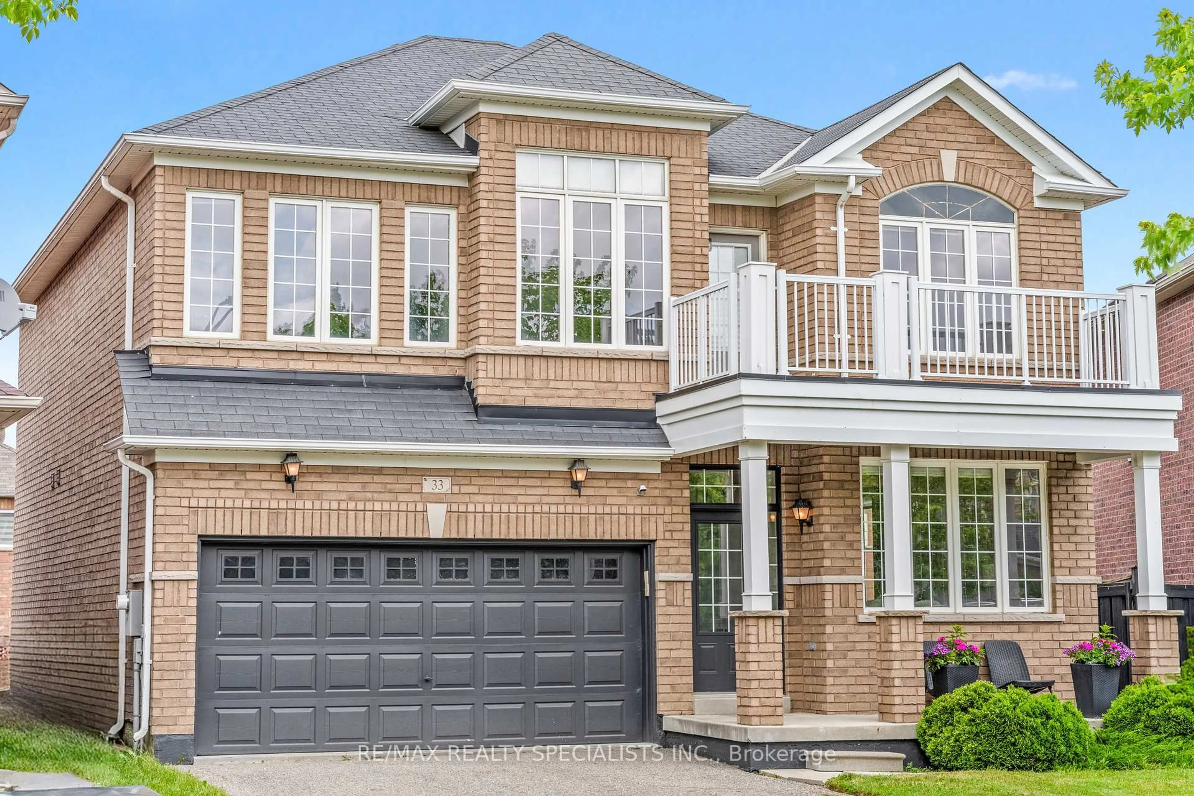 Home with brick exterior material, street for 33 Delphinium Way, Brampton Ontario L7A 0N4