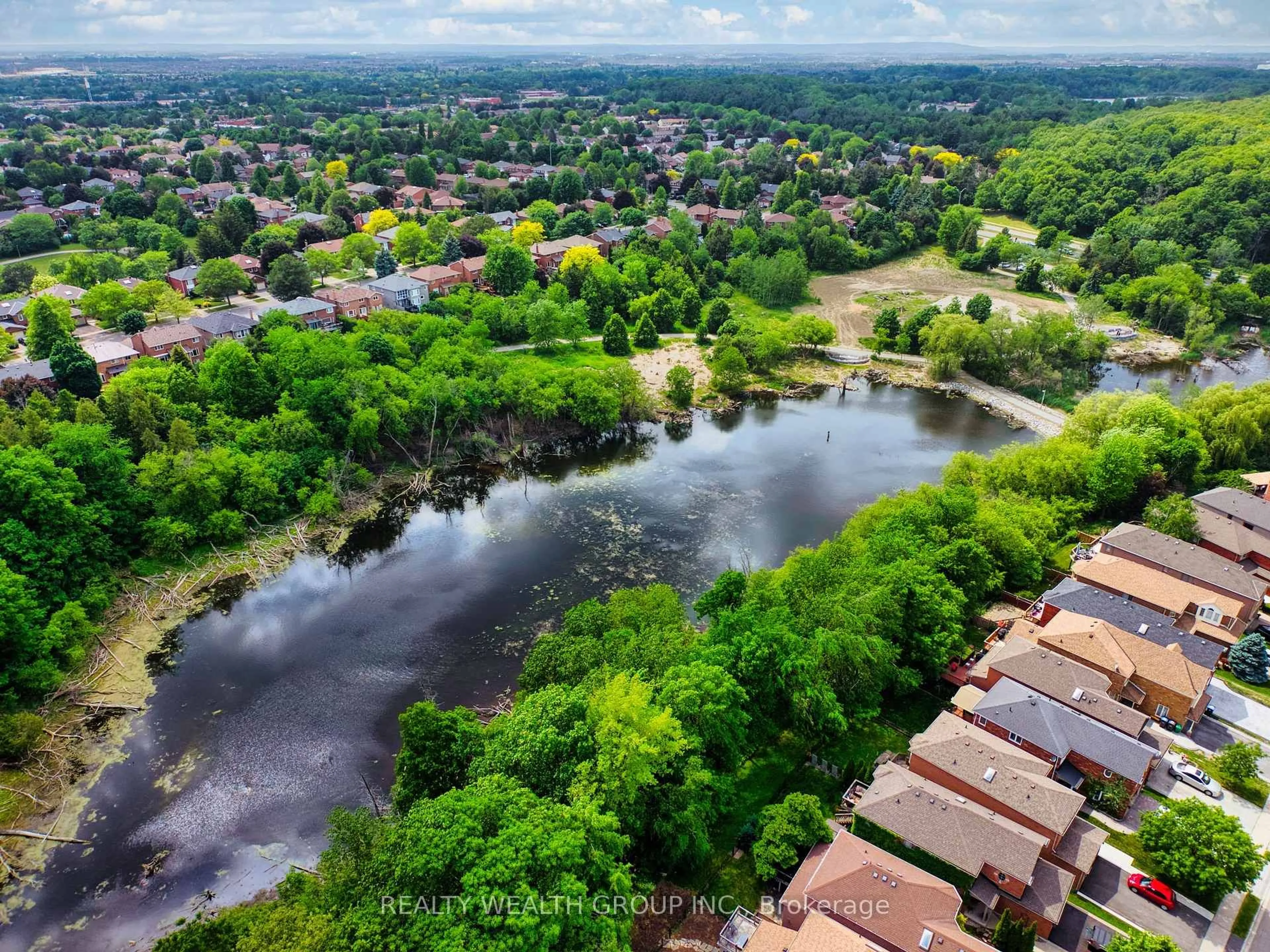 A pic from outside/outdoor area/front of a property/back of a property/a pic from drone, water/lake/river/ocean view for 11 Birchcliffe Dr, Brampton Ontario L6Z 4T3
