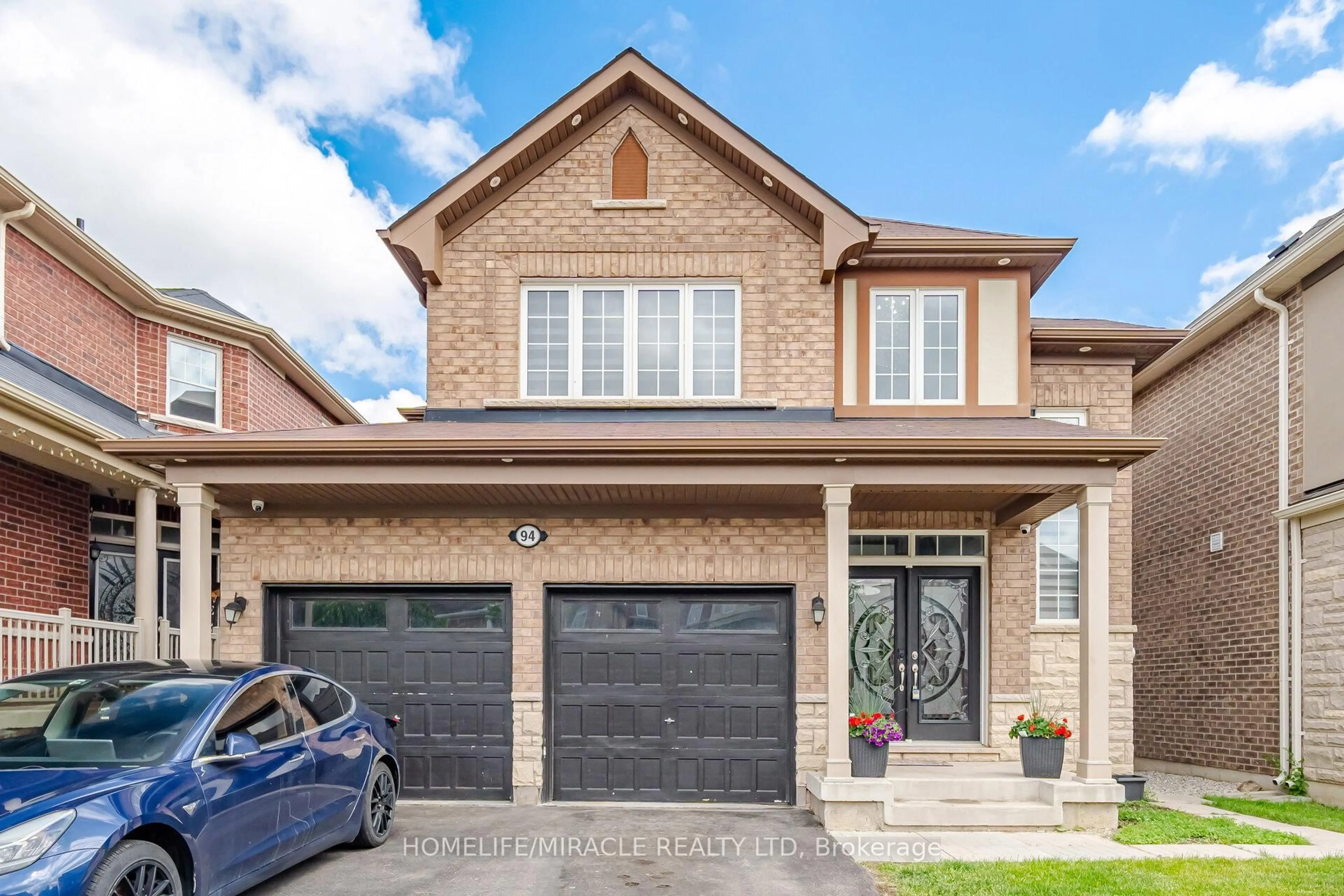 Home with brick exterior material, street for 94 Mincing Tr, Brampton Ontario L7A 4S9