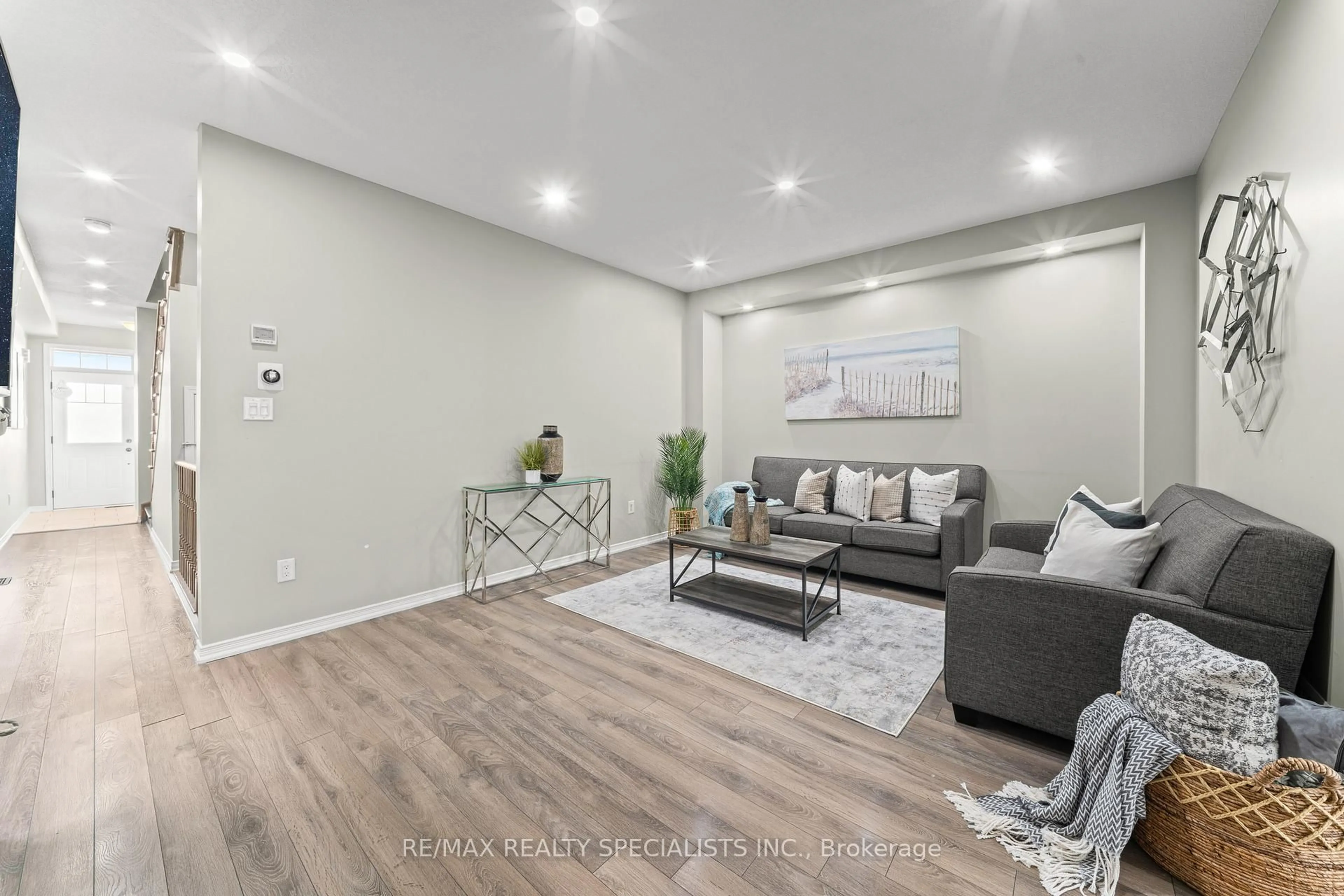Living room with furniture, unknown for 67 Baffin Cres, Brampton Ontario L7A 4L1