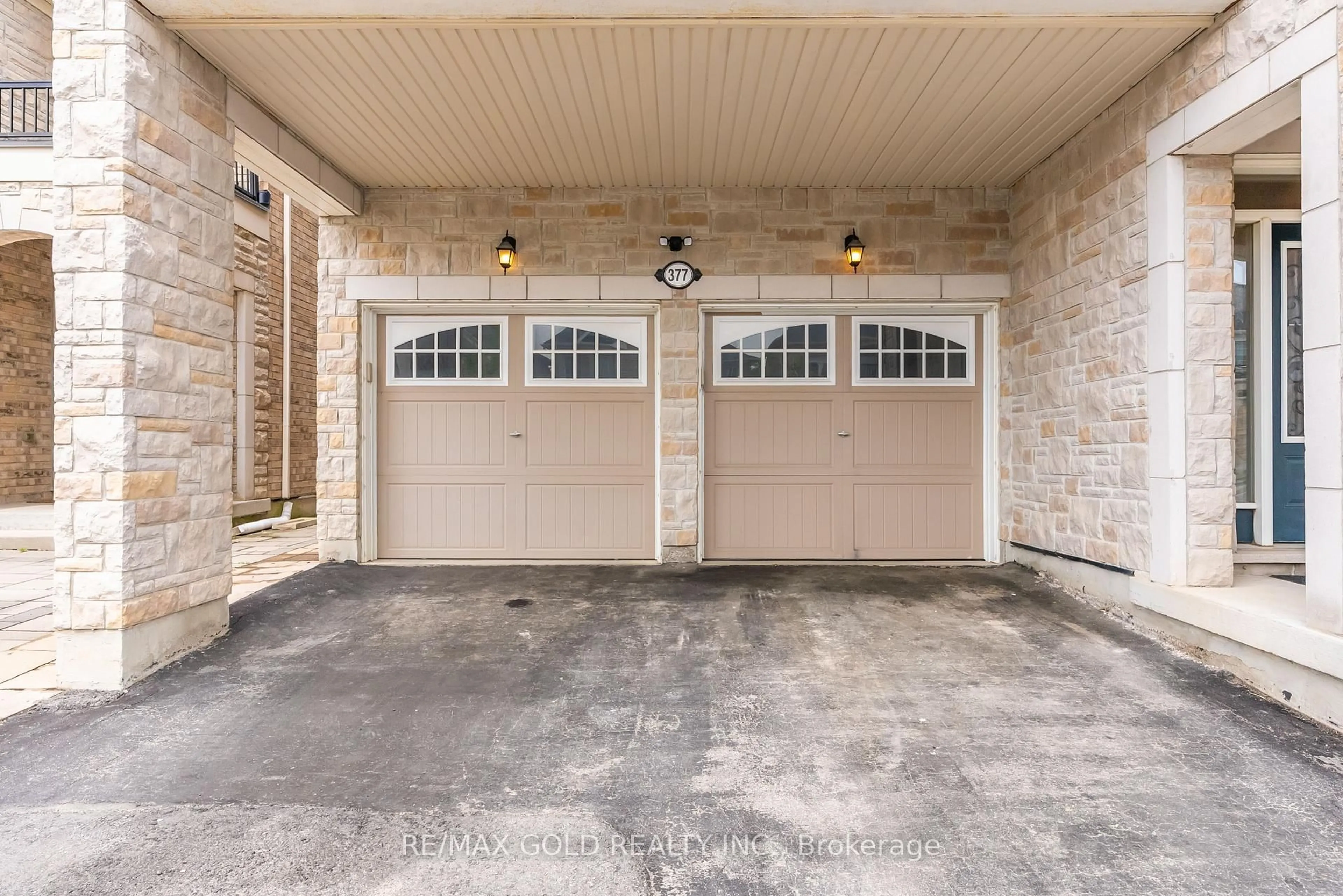 Indoor garage for 377 Etheridge Ave, Milton Ontario L9E 0A5