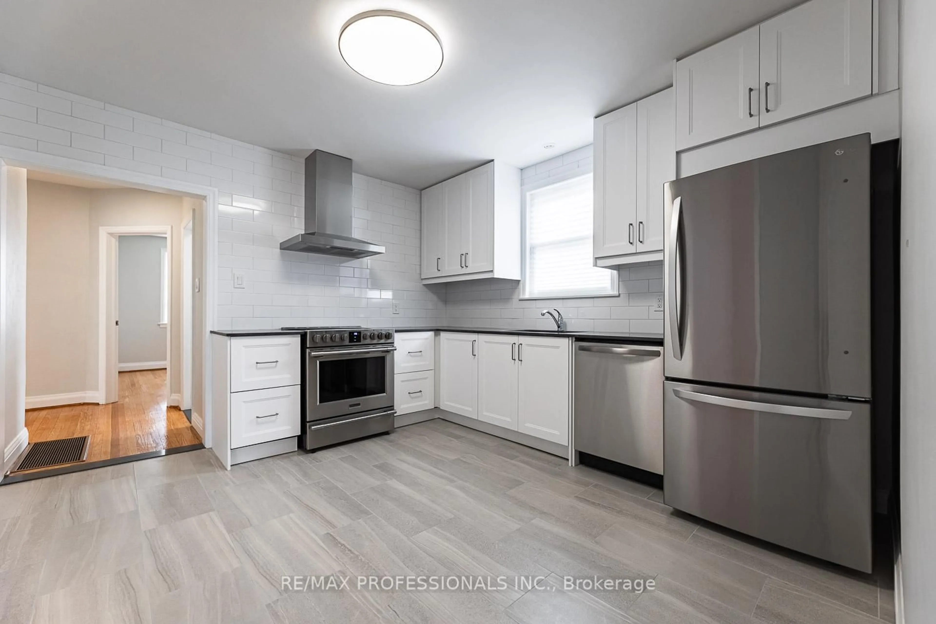 Open concept kitchen, unknown for 11 Stock Ave, Toronto Ontario M8Z 5C3
