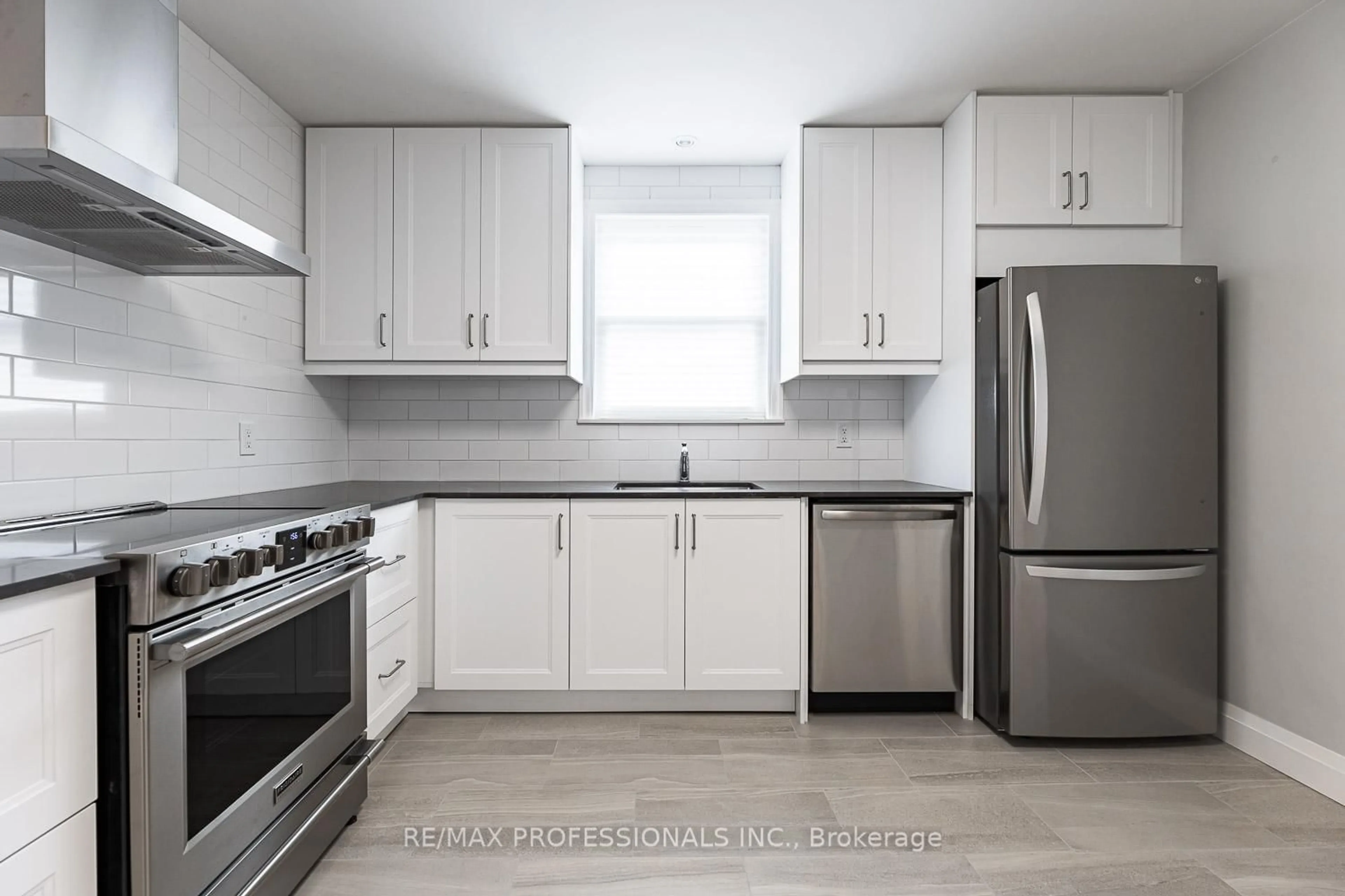 Standard kitchen, ceramic/tile floor for 11 Stock Ave, Toronto Ontario M8Z 5C3
