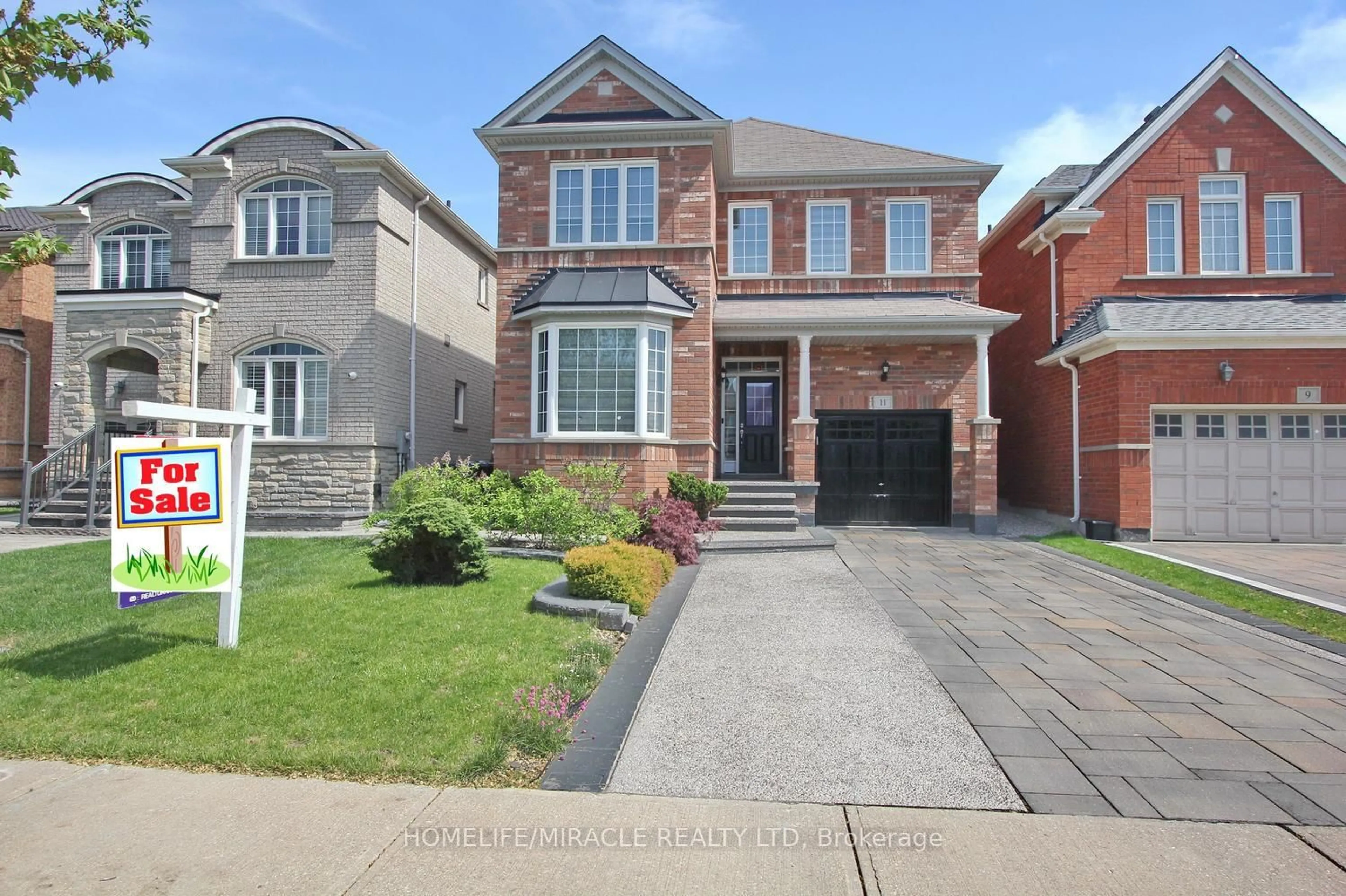 Home with brick exterior material, street for 11 Bluffmeadow St, Brampton Ontario L6P 3K3