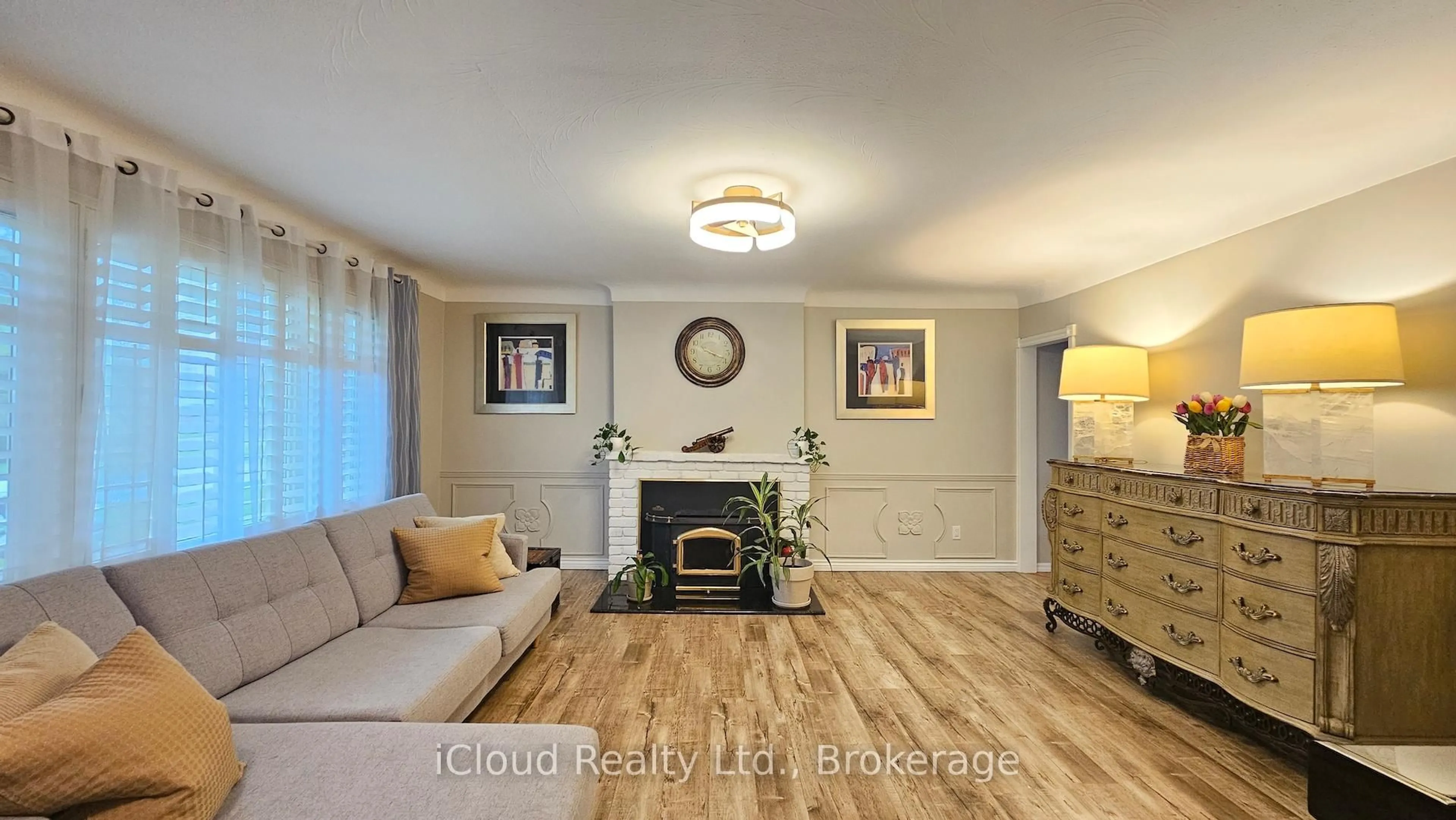 Living room with furniture, wood/laminate floor for 1066 Marley Cres, Burlington Ontario L7T 3S1