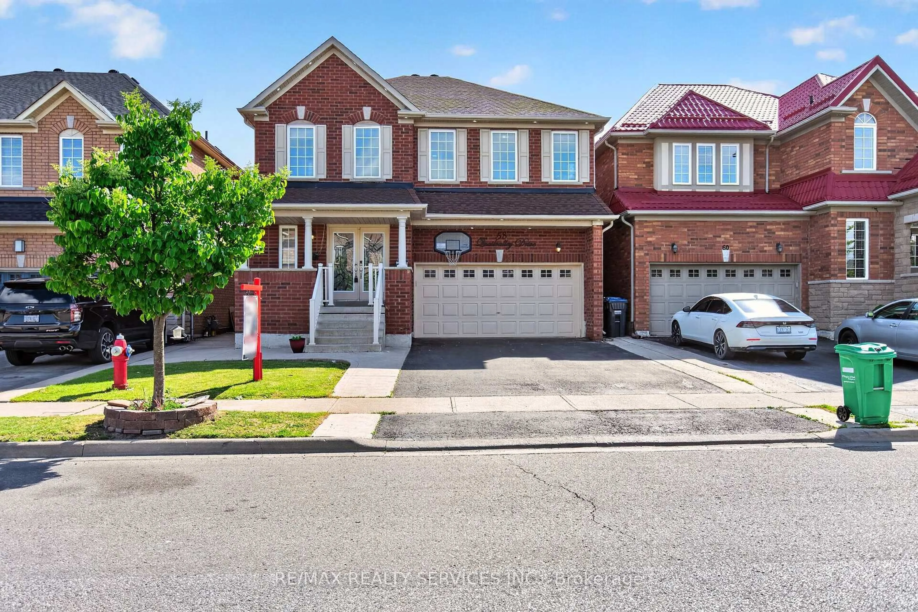 Home with brick exterior material, street for 58 Quailvalley Dr, Brampton Ontario L6R 0N4