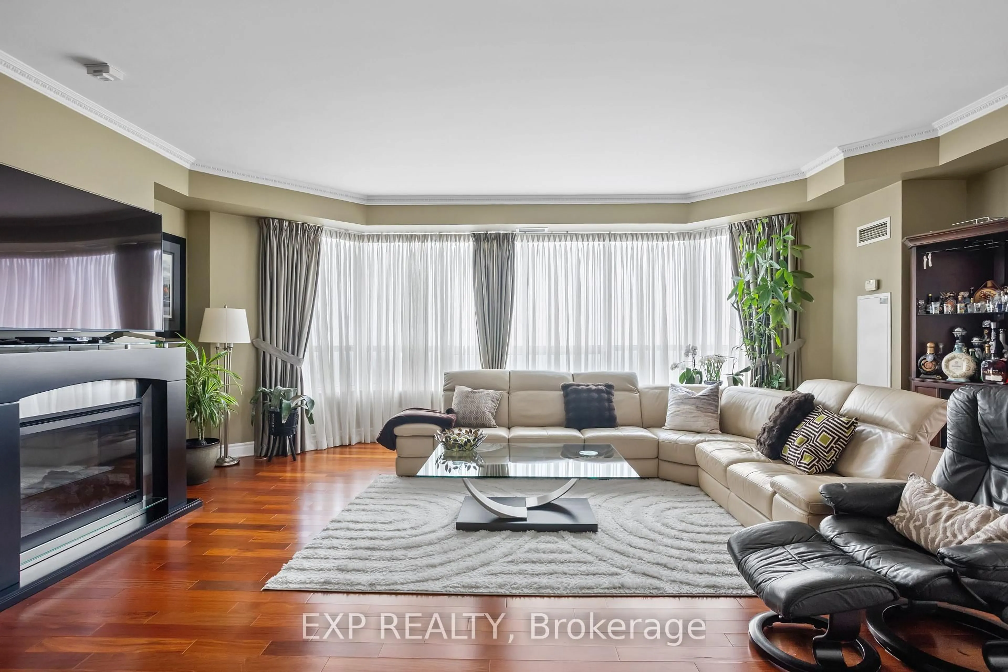 Living room with furniture, unknown for 25 Kingsbridge Garden Circ #2709, Mississauga Ontario L5R 4B1